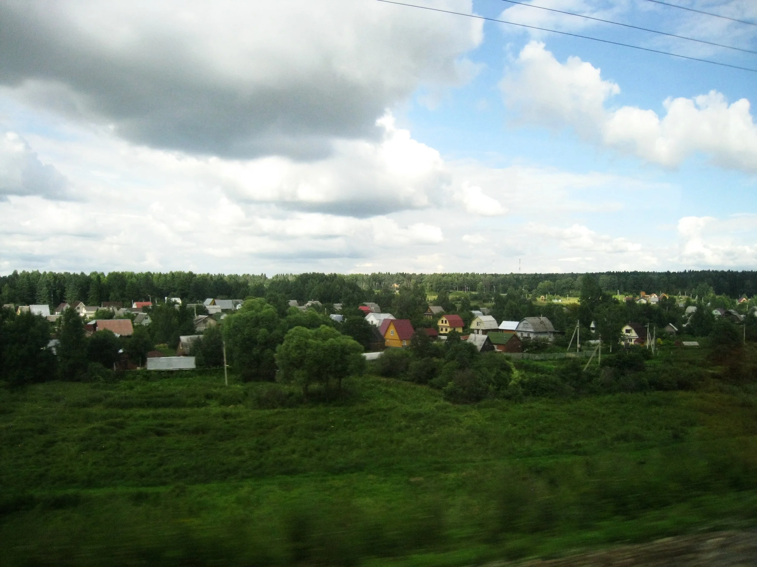 Russia--View from the train between St. Petersburg and Moscow--Countryside/Small town 