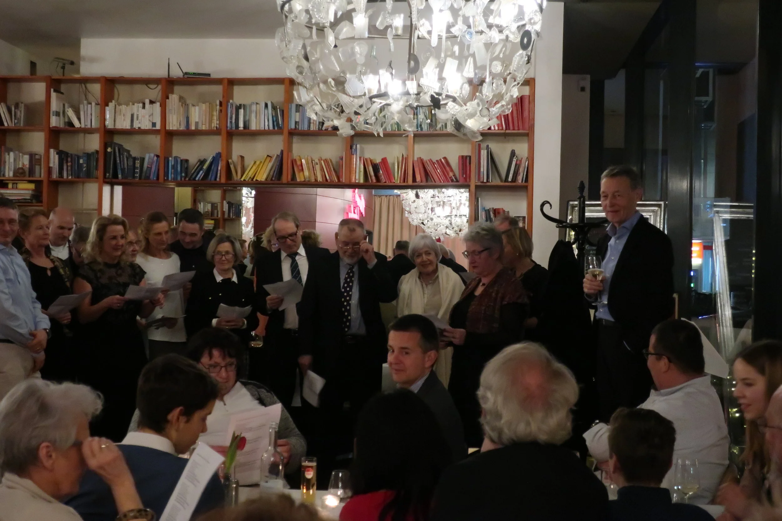  Cologne--Winter 2019--Harald Grieser's 80th birthday--Renata Schneider and group singing to Harald Grieser at Lithtenberg Cafe. 