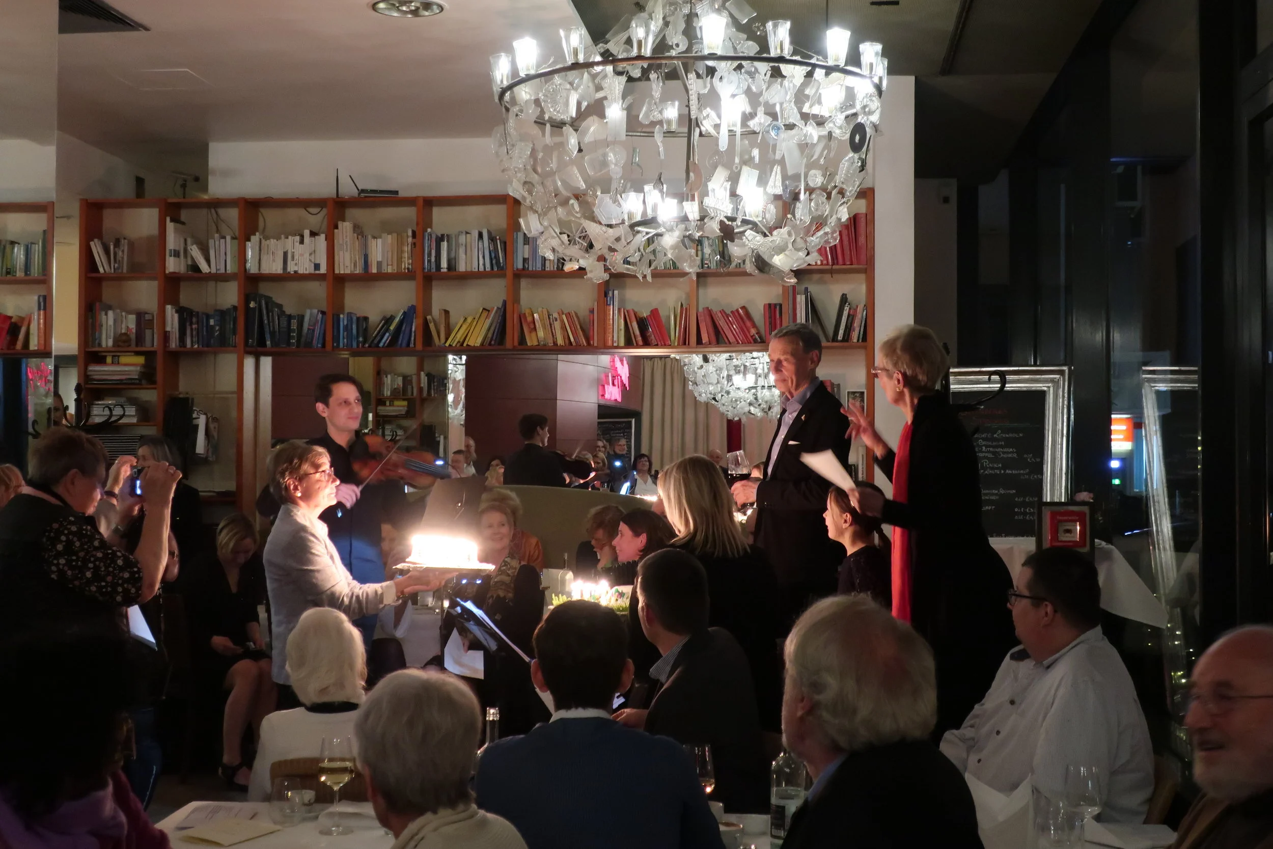  Cologne--Winter 2019--Harald Grieser's 80th birthday at Lithtenberg Cafe. Serenading Harald Grieser 