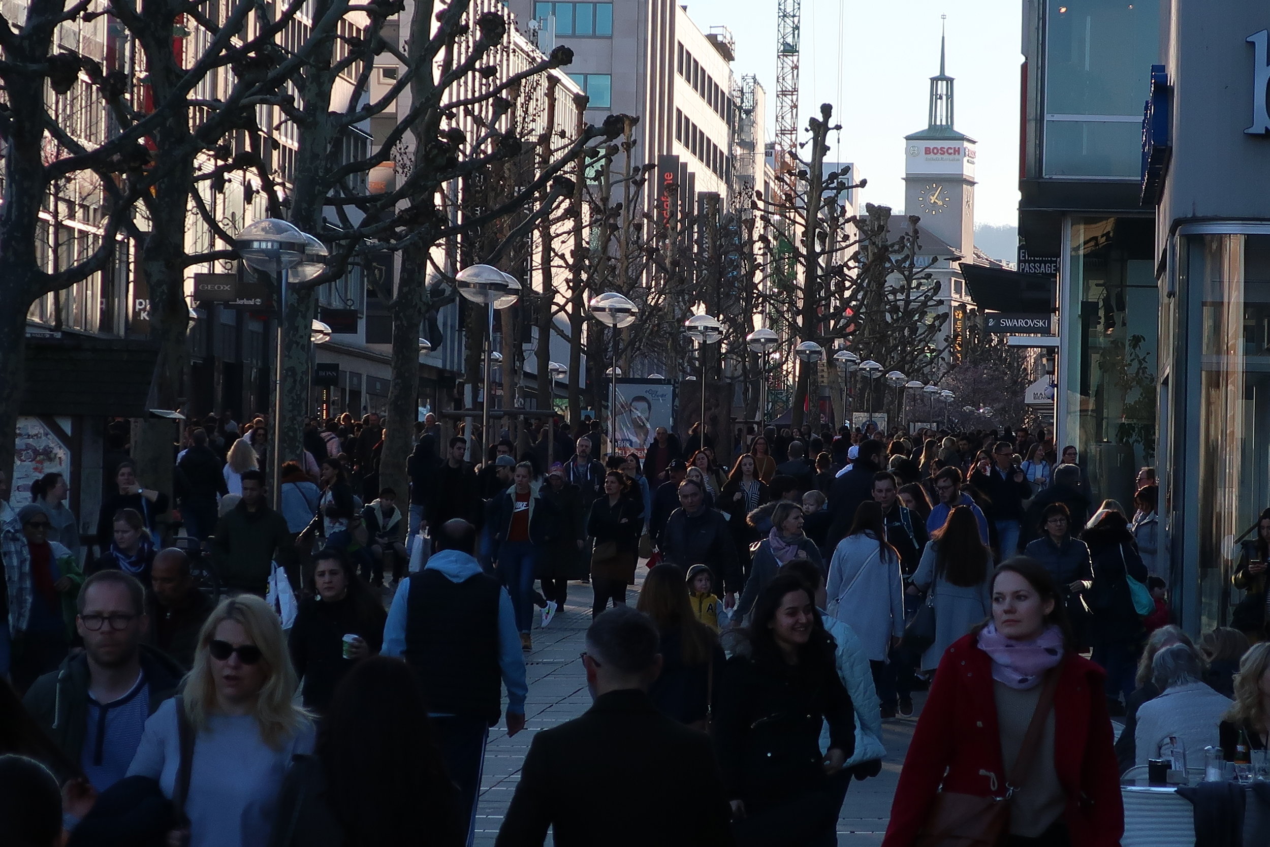  Stuttgart--Winter 2019--Konigstrasse, the main, mile long, shopping street on a nice day in February and the Bosch tower 