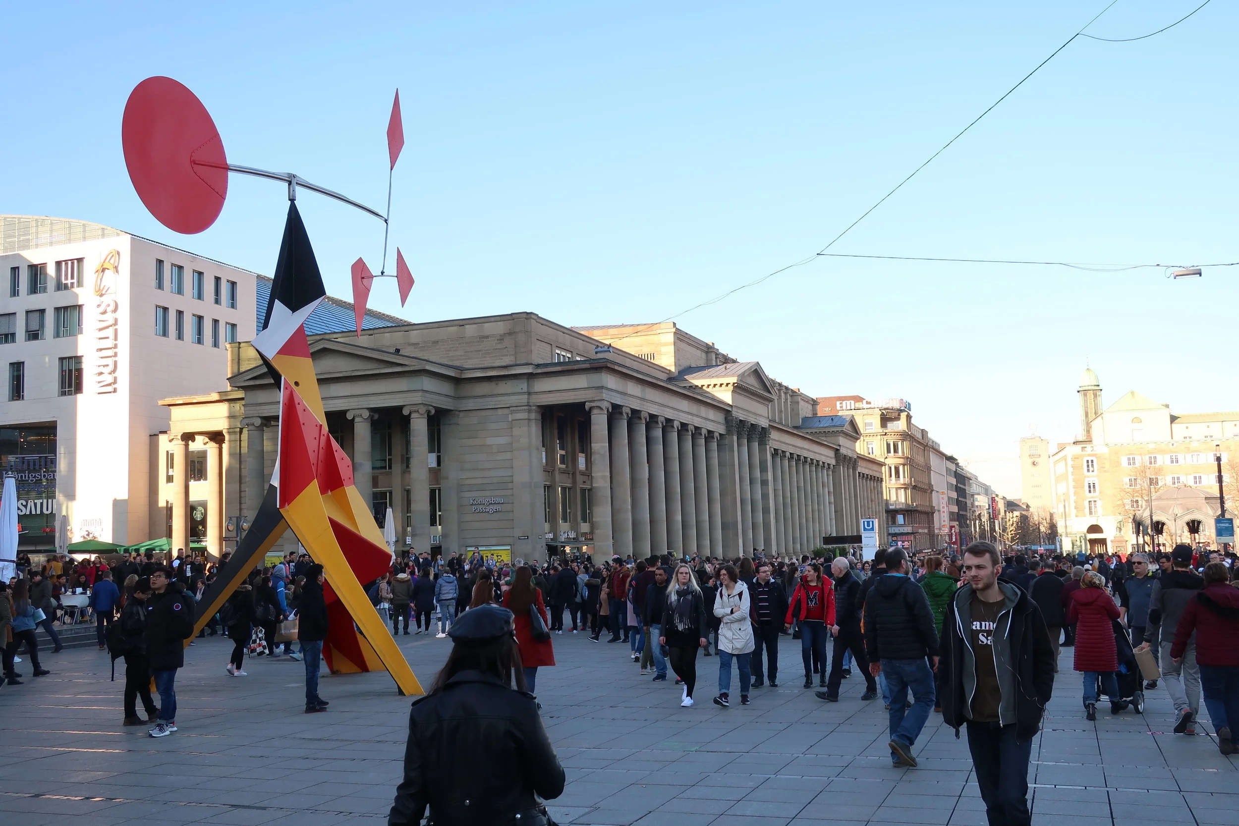  Stuttgart--Winter 2019--Konigstrasse, the main, mile long shopping street on a nice day in February with a Calder stabile 