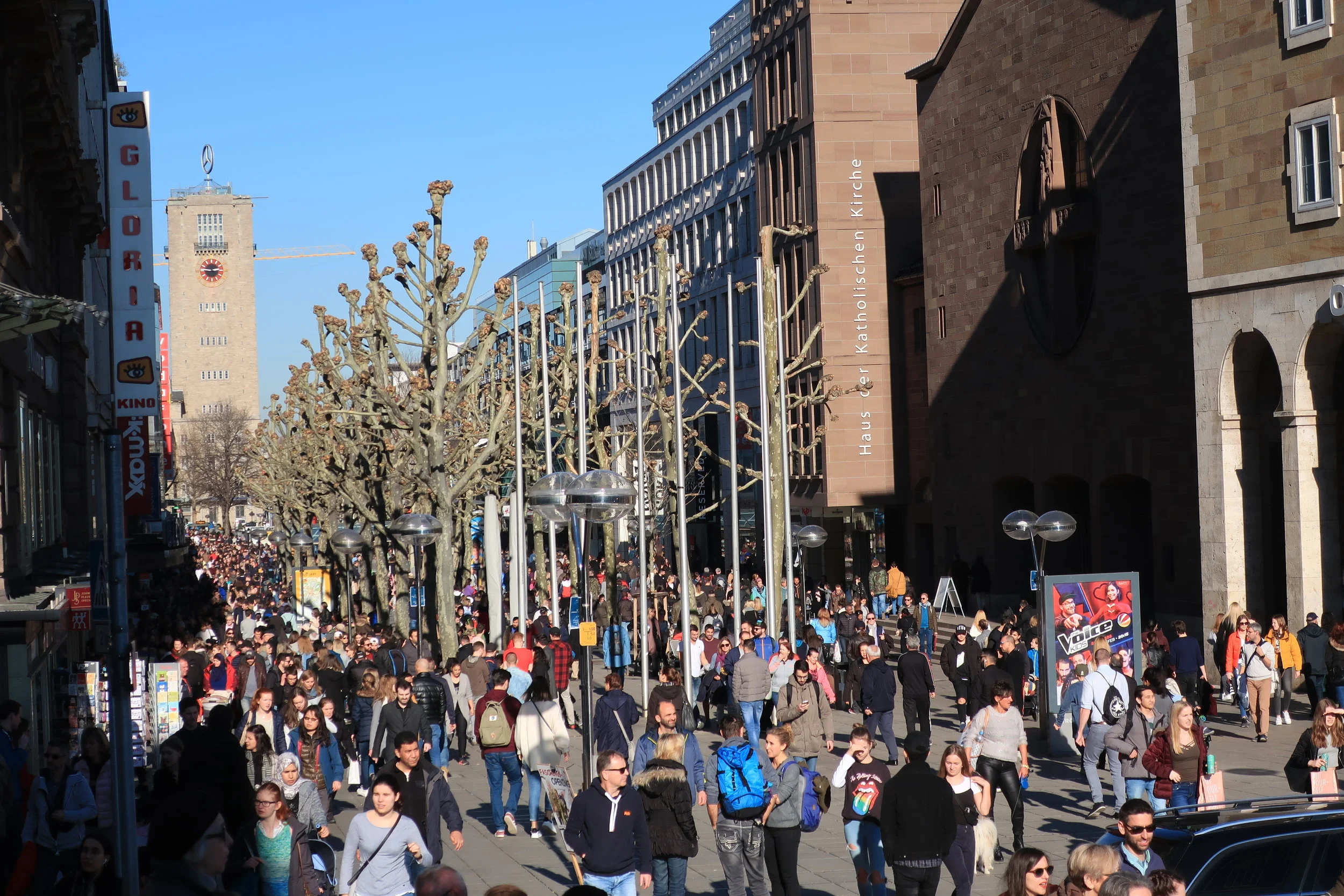  Stuttgart--Winter 2019--Konigstrasse, the main, mile long, shopping street on a nice day in February and the train station tower 