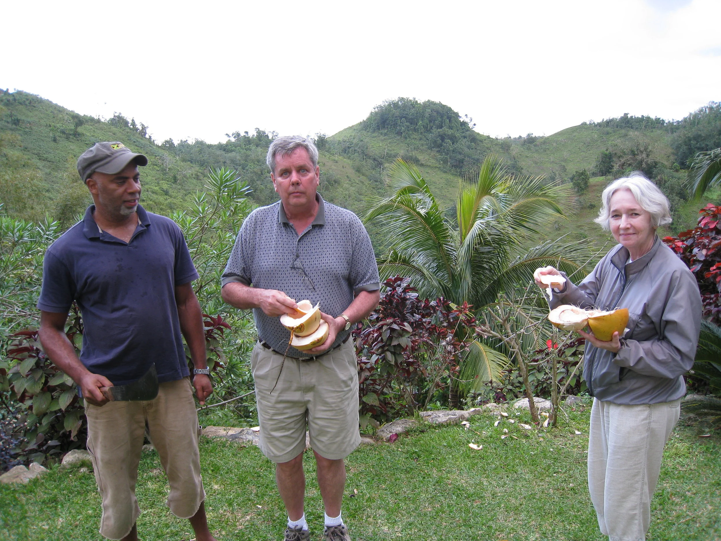  Cary Lewar, Roger King and Carrol Benner Kindel eating coconuts at Cary's house 