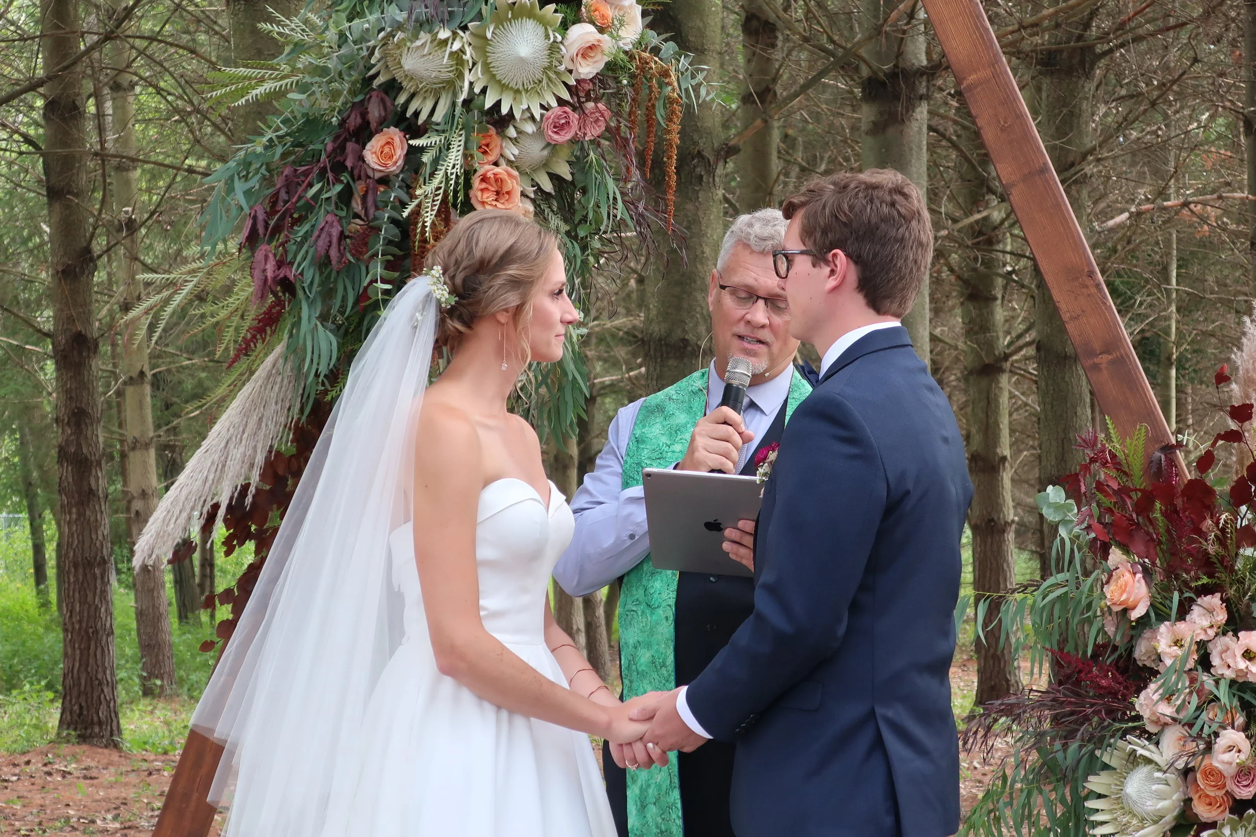  Appleton, Wis.--Sept. 1, 2019--Andropolis-Coakley Wedding--Bubolz Nature Preserve--Alex and Kenzie during the ceremony 