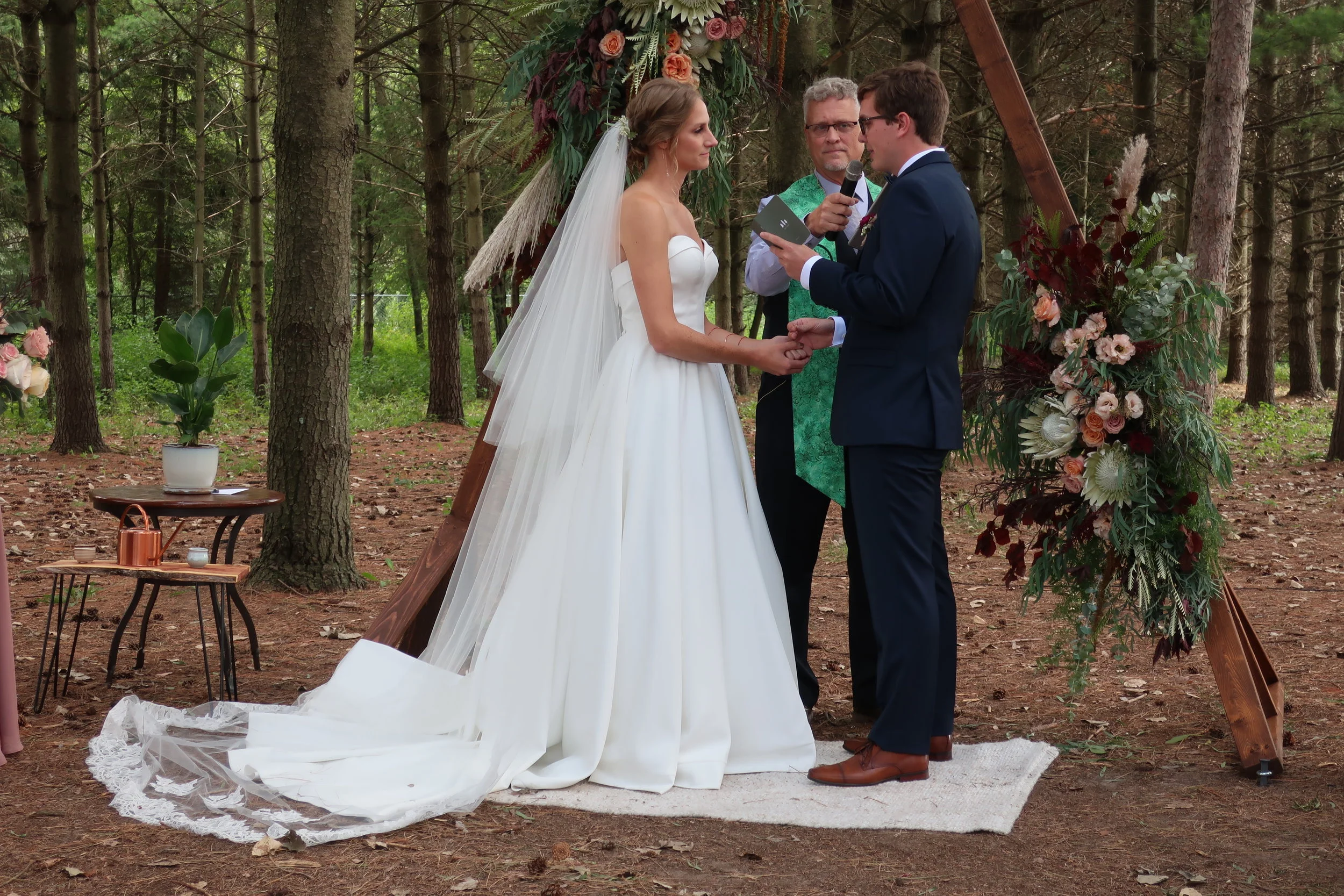  Appleton, Wis.--Sept. 1, 2019--Andropolis-Coakley Wedding--Bubolz Nature Preserve--Alex and Kenzie during the ceremony 