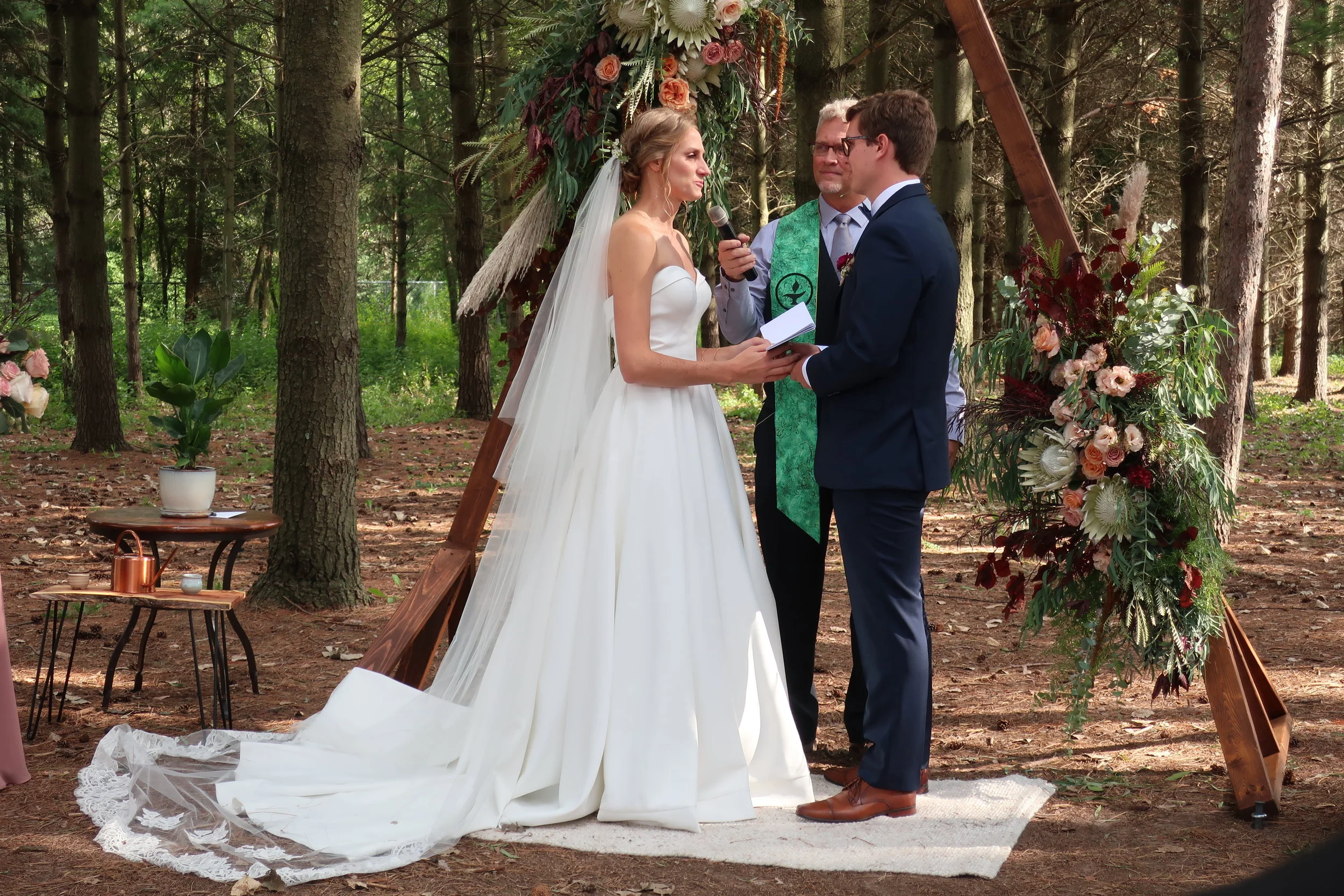  Appleton, Wis.--Sept. 1, 2019--Andropolis-Coakley Wedding--Bubolz Nature Preserve--Alex and Kenzie during the ceremony 