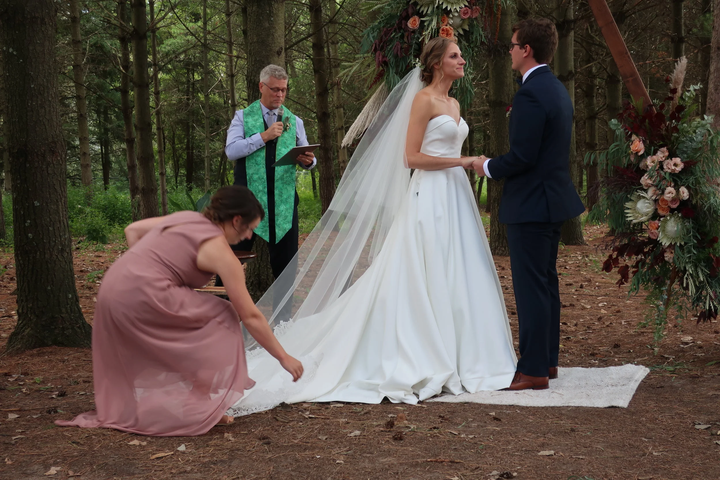  Appleton, Wis.--Sept. 1, 2019--Andropolis-Coakley Wedding--Bubolz Nature Preserve--Pronouncing them man and wife 