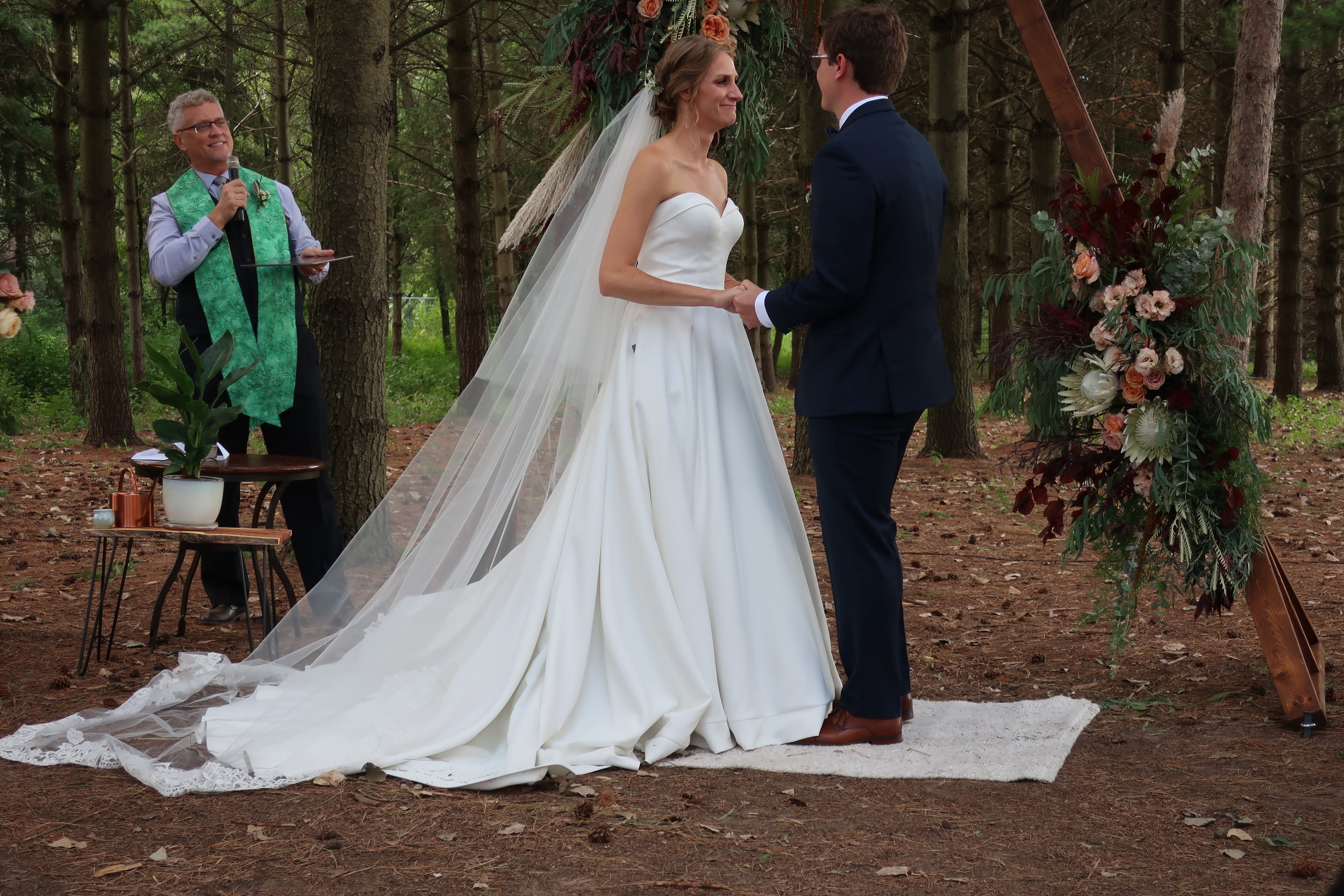  Appleton, Wis.--Sept. 1, 2019--Andropolis-Coakley Wedding--Bubolz Nature Preserve--Pronouncing them man and wife 