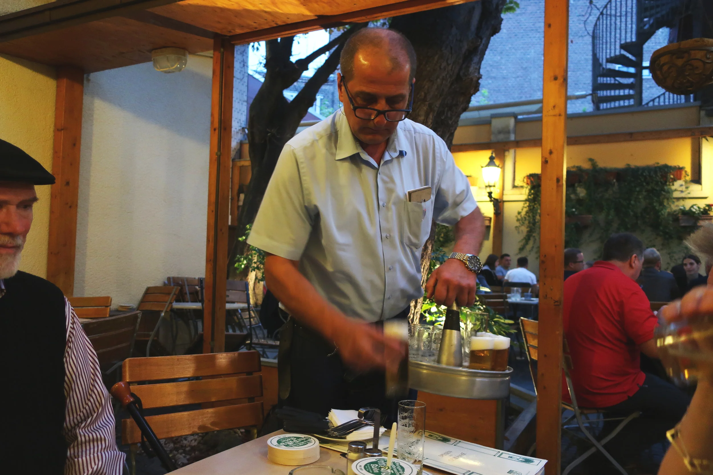  Cologne 2019--Pfaeffgen Brewery--a typical waiter with his tray of Koelsch beer 