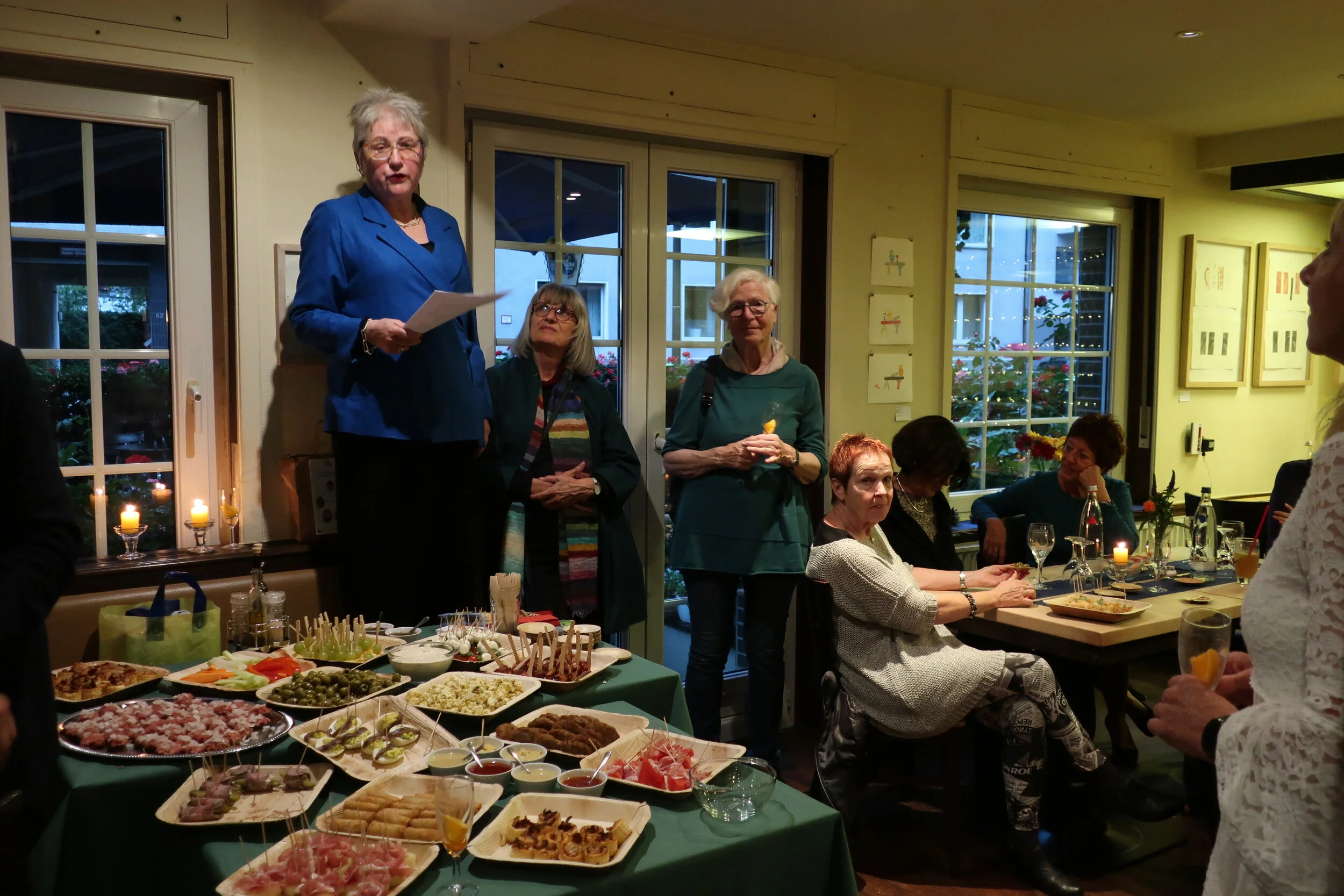  Cologne 2019--Renate Schneider's 70th Birthday at Blumenthaler Pub--Renate giving a speech (Note the food) 