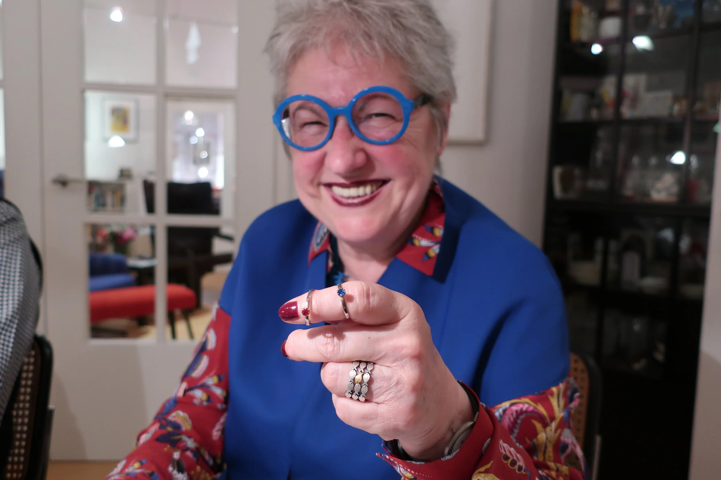  Cologne 2019--Dinner of smoked salmon and lamb at Renate and Joerg's-- Renate Schneider showing their wedding rings (from Kindel's via King) 