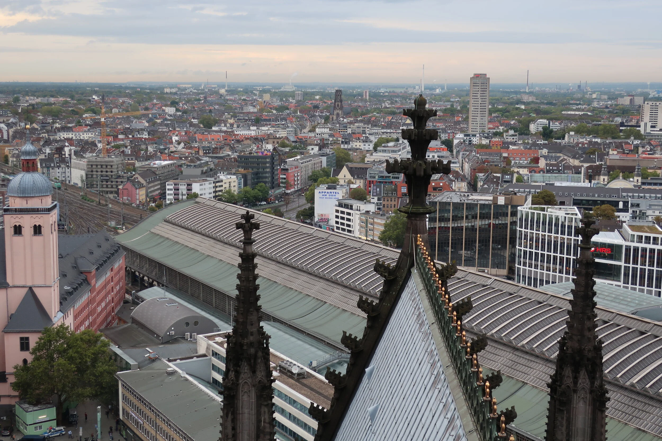  Cologne 2019--Cologne Cathedral insider's tour of the high reaches of the Cathedral--View from the modern steeple--with the Cathedral roof in front looking north over the railroad station 