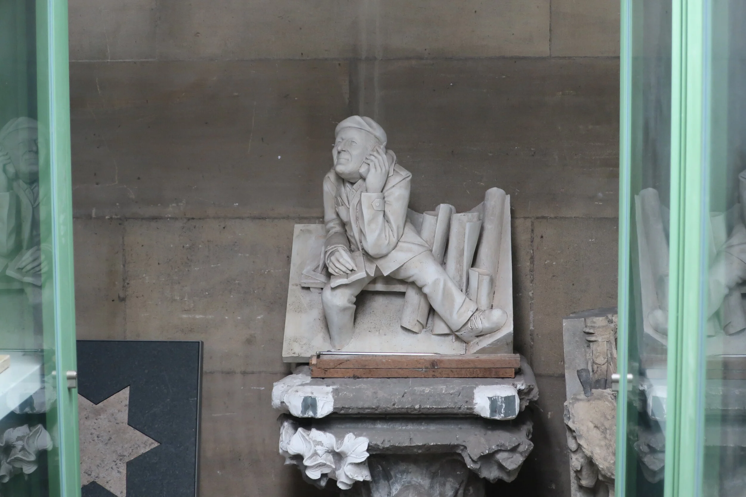  Cologne 2019--Cologne Cathedral insider's tour of the high reaches of the Cathedral--Gargoyle and Grotesques storage--all hand carved. Even modern characters with a cell phone! 