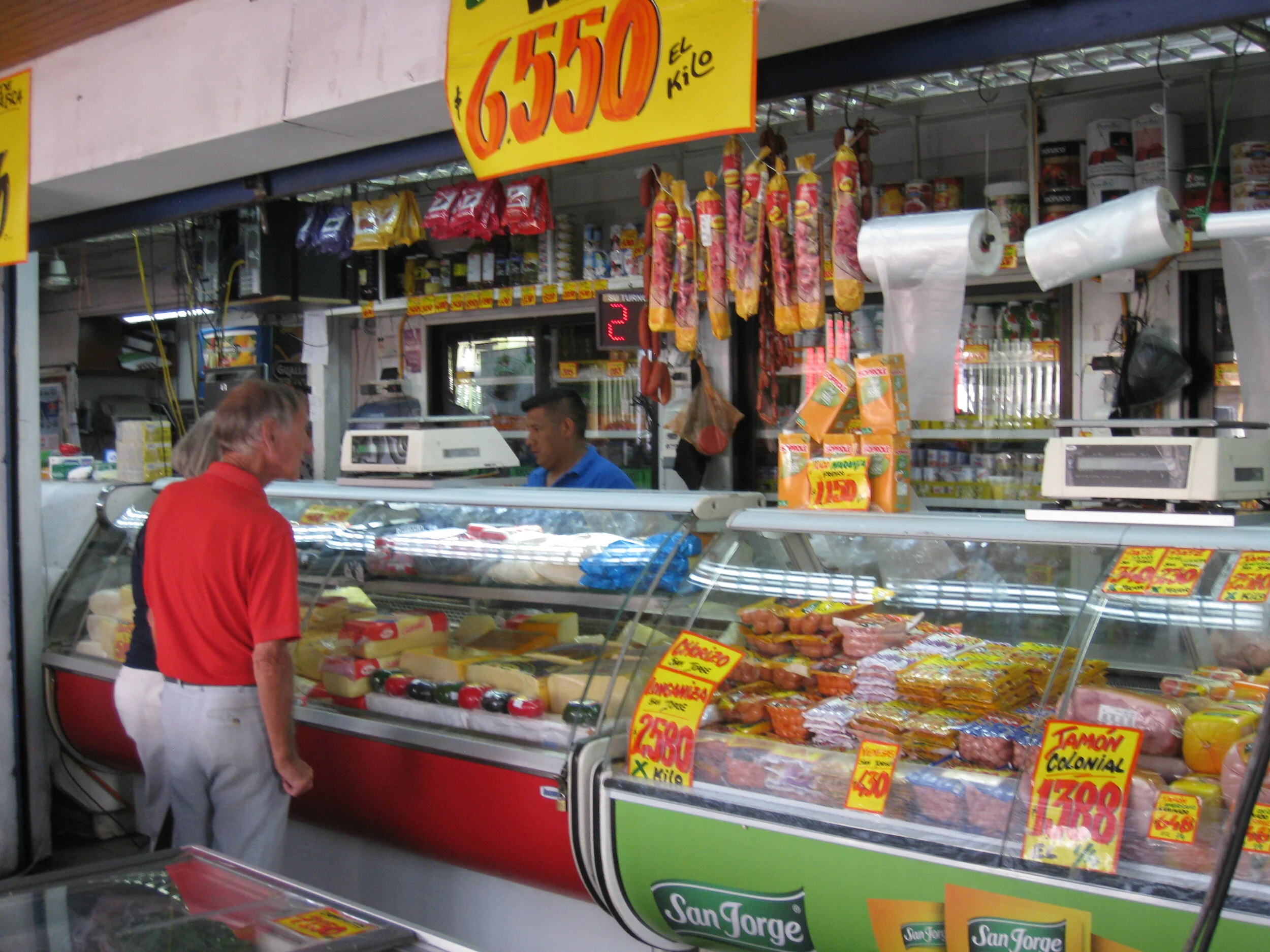  Santiago--The Vega--View inside the Vega Central--Paul Cullingford and Carrol buying cheese 