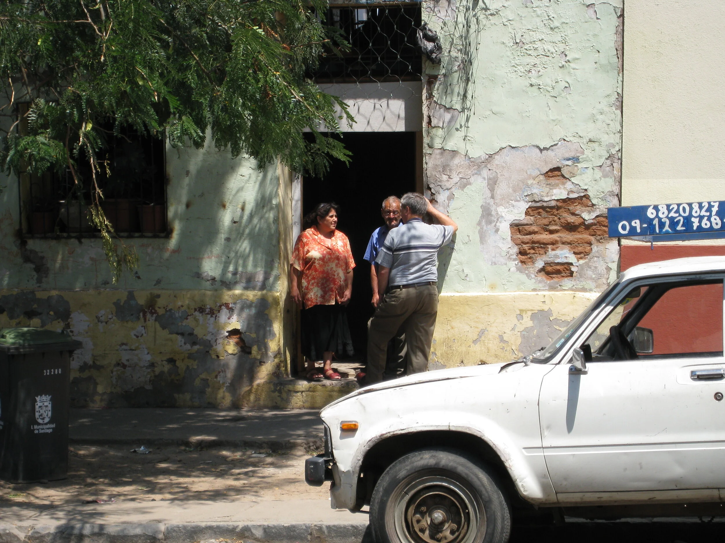  Santiago--Herrera--Roger talking to people across the street 