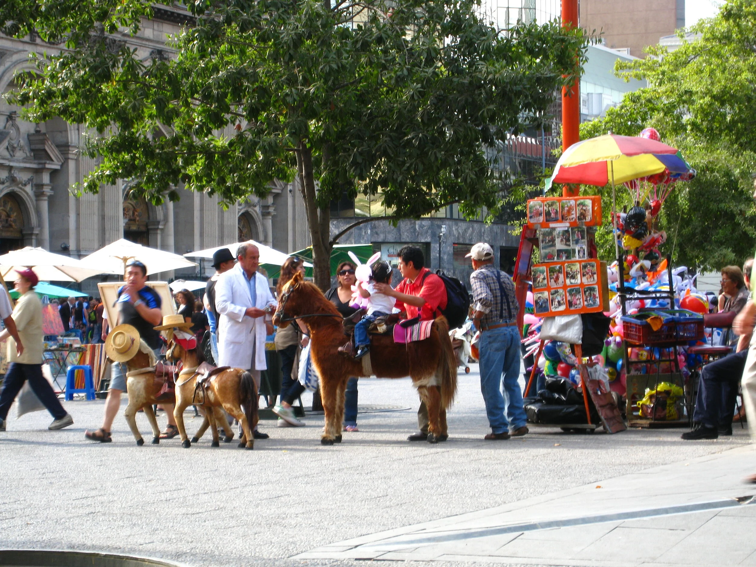  Photographer and subjects--Plaza de Armas Santiago 