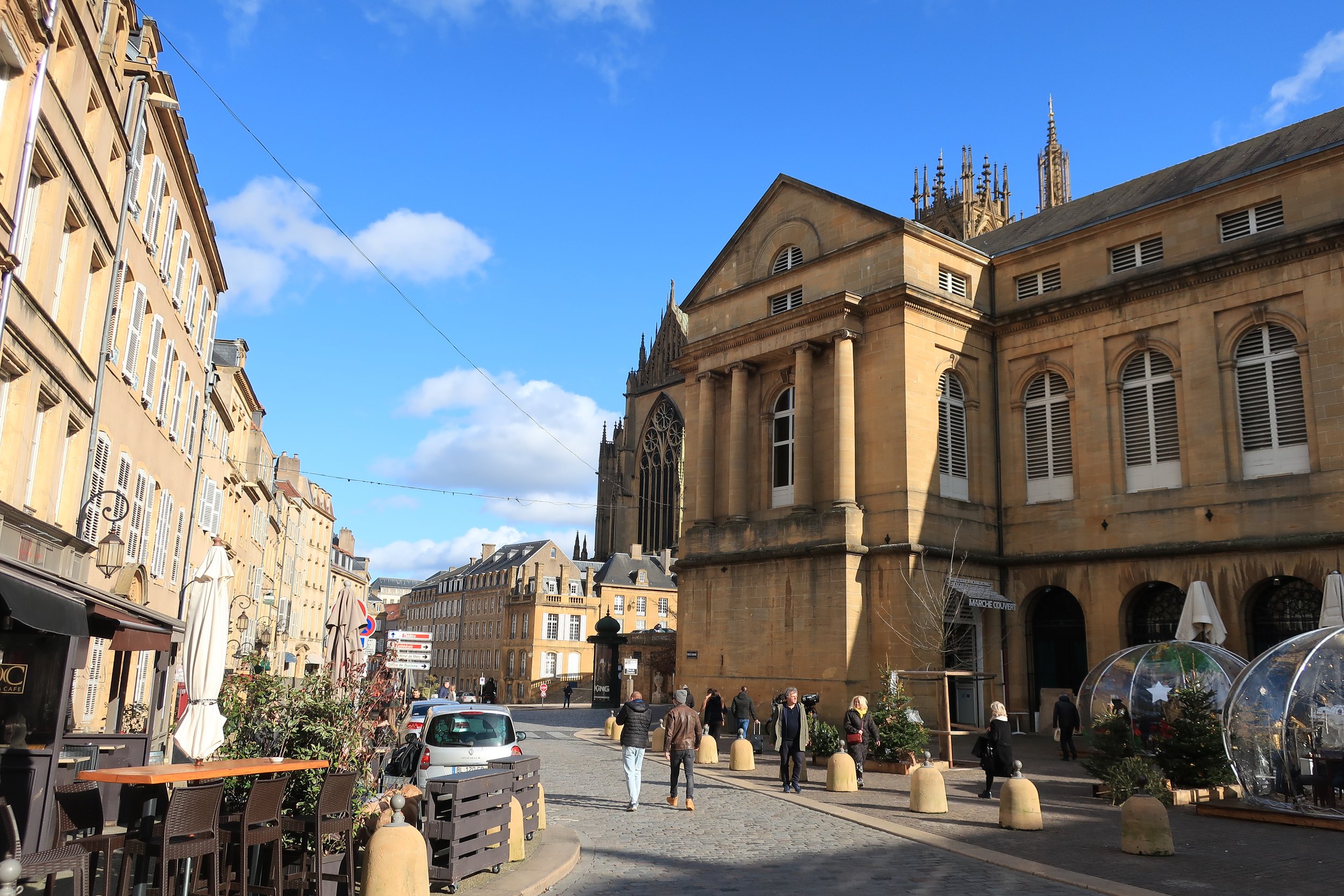  Metz, France--Feb. 2022--Old Town, Place de Chambre--Dining igloos and back of Covered Market 