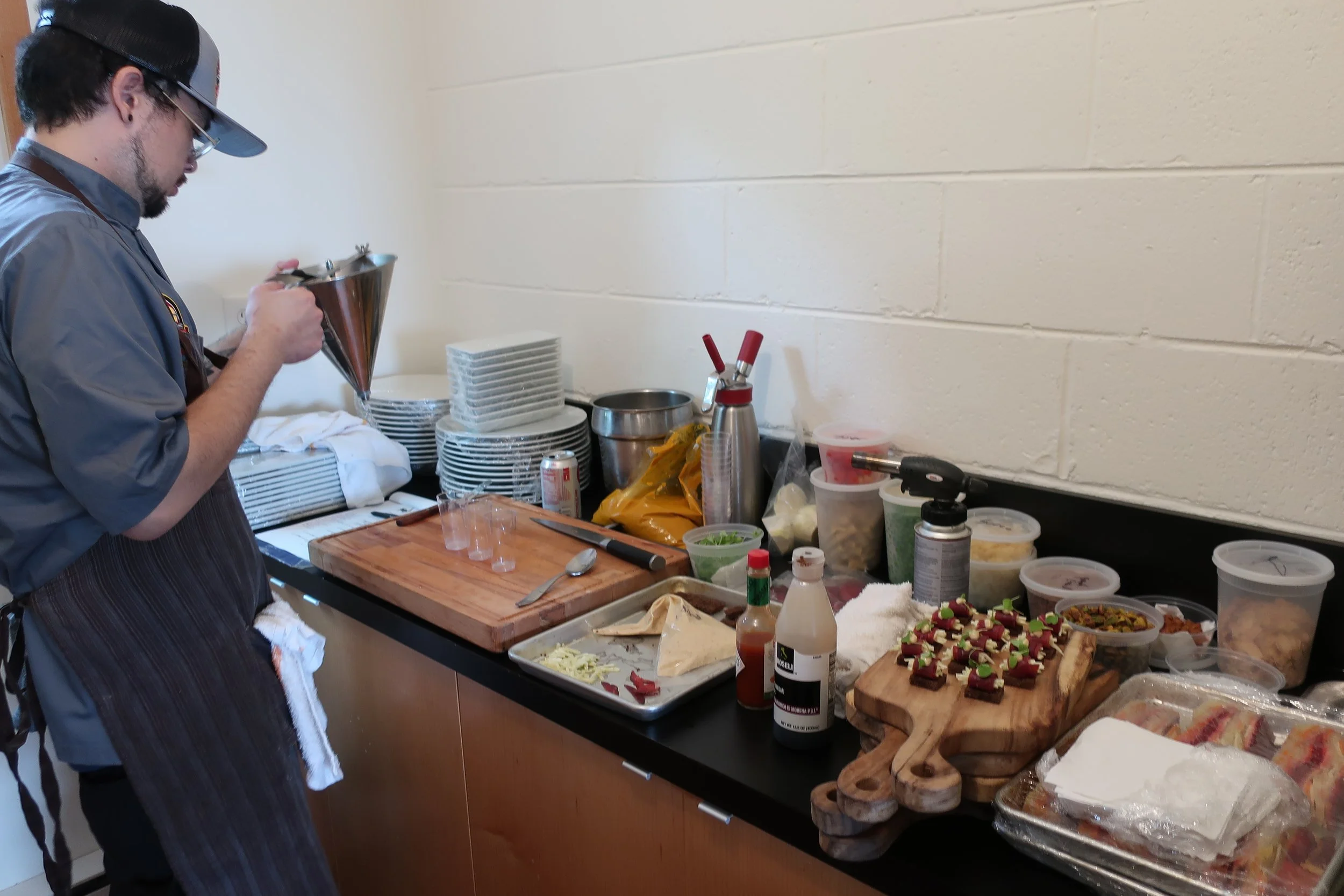  Kent Island--June 2022--50th Wedding Celebration--Chef Ricky preparing food for dinner 