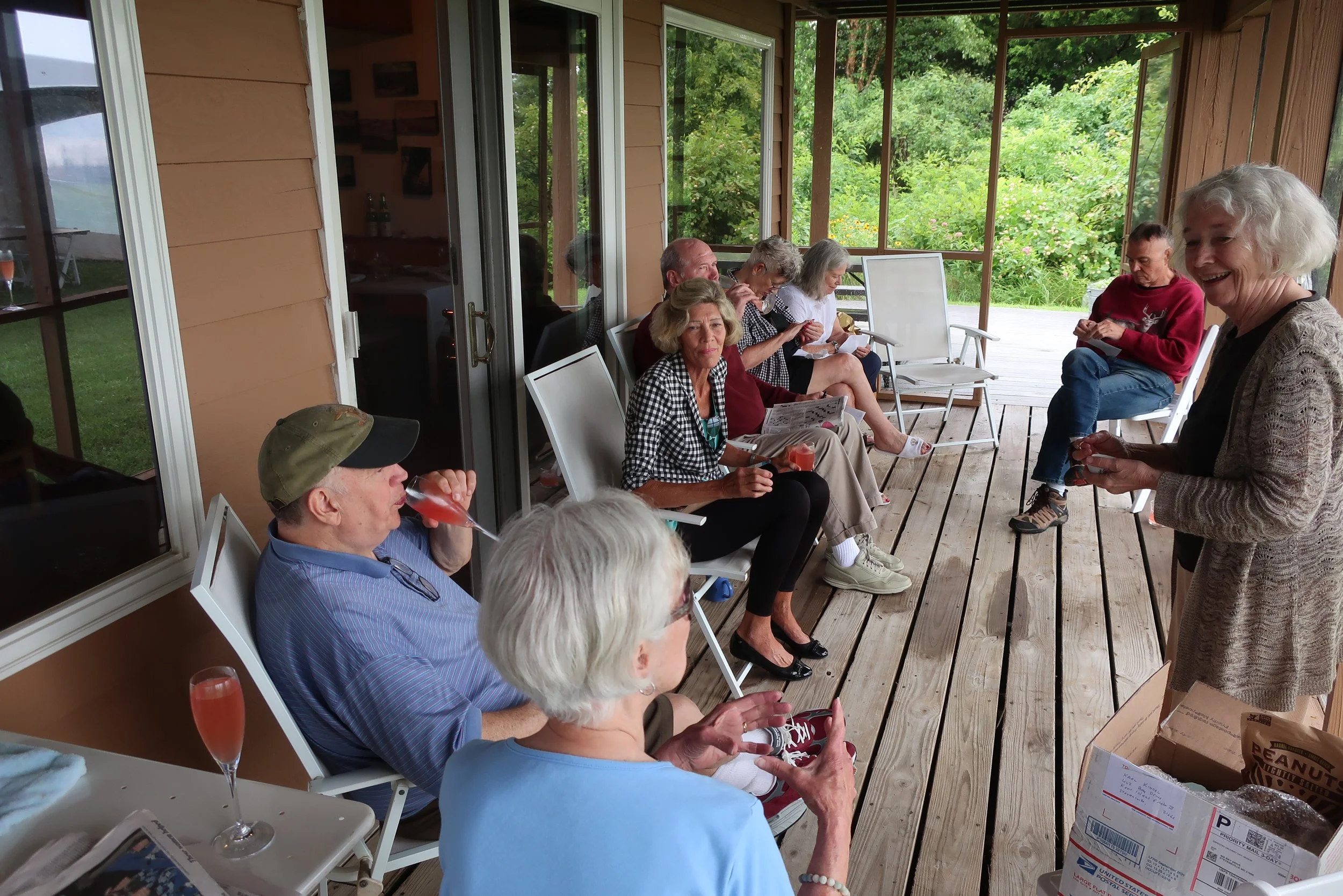  Kent Island--June 2022--50th Wedding Celebration--Carrol Benner Kindel, showing rings to Marilyn Fanning, Jamie Ennis, Debbie Schreiber, Rick Schreiber, Maggie Hall, Jan Ennis and Steve Kohlhaas 