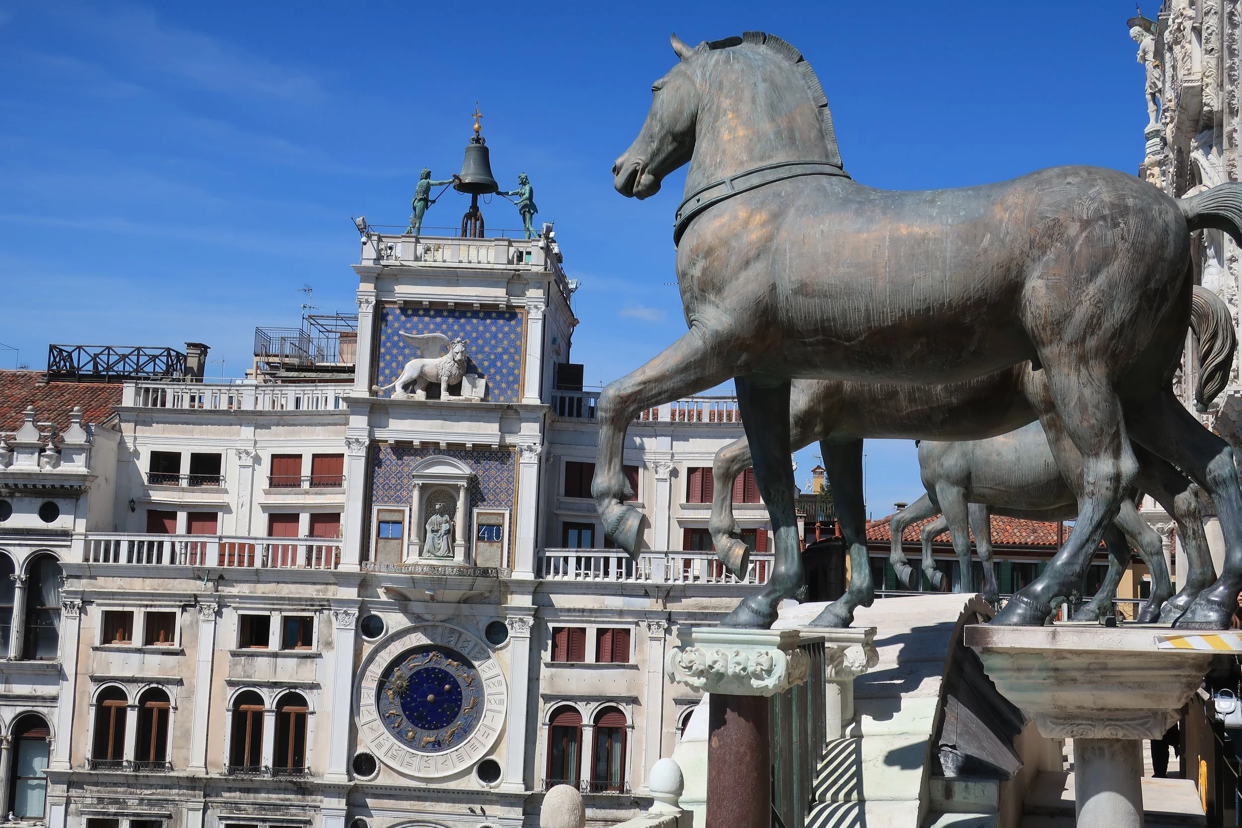  Venice 2023--San Marco Square with replica hourses and clock, lion and bell symbol 