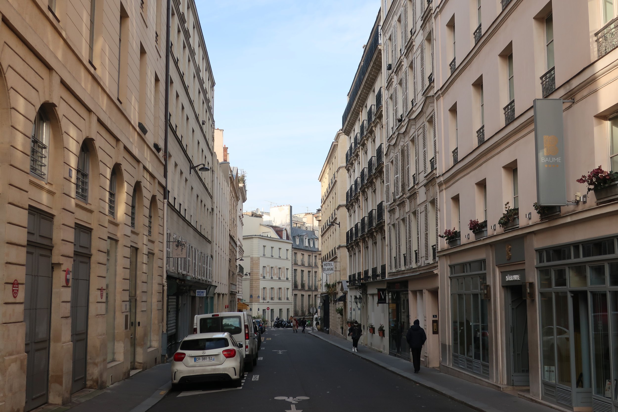  Paris--Spring 2025--Our street (Rue Casimir Delavigne) with the Hotel des Balcons (the Odeon is behind the photographer). 