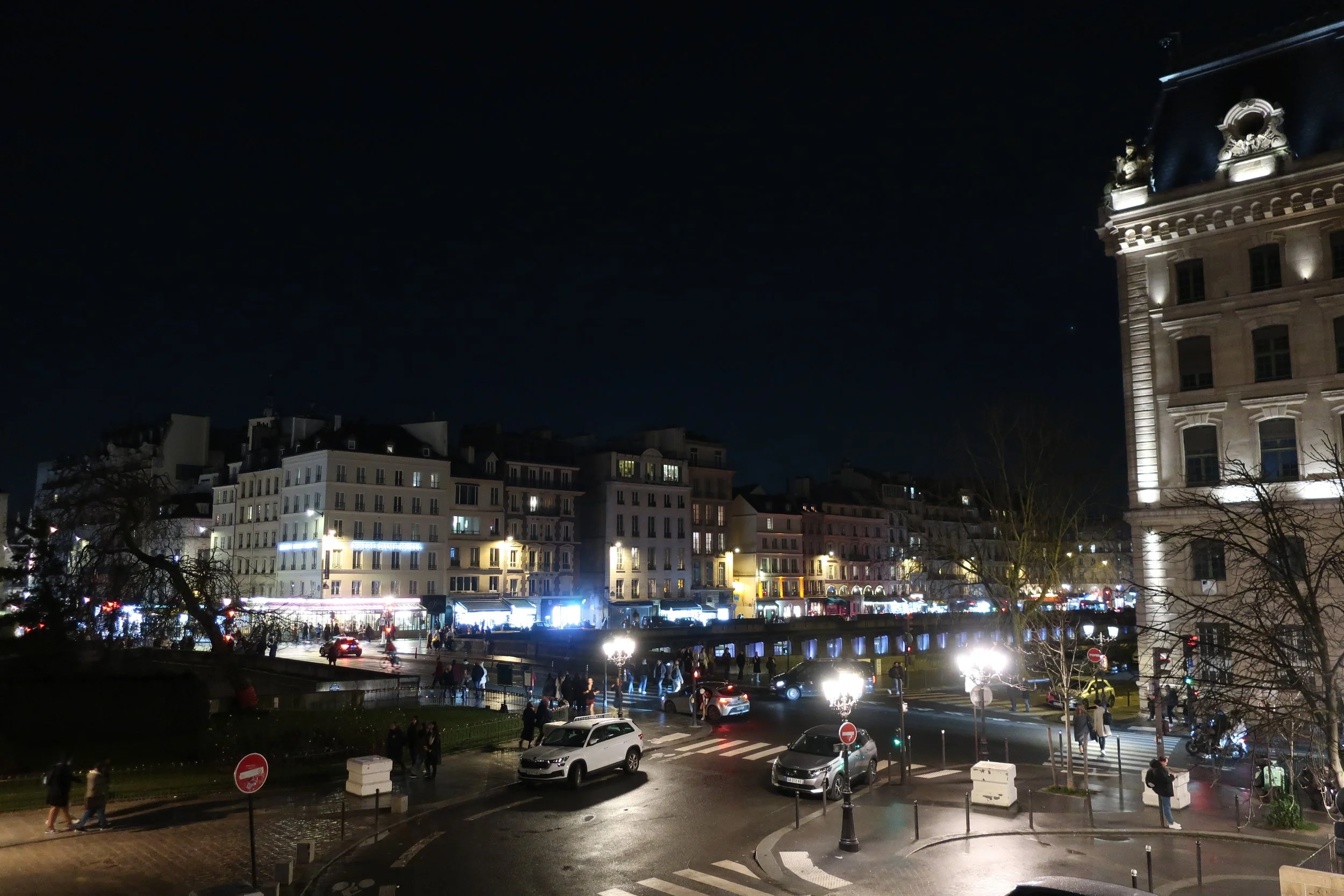  Paris--Spring 2025--At the Seine from the plaza with Notre Dame at night 