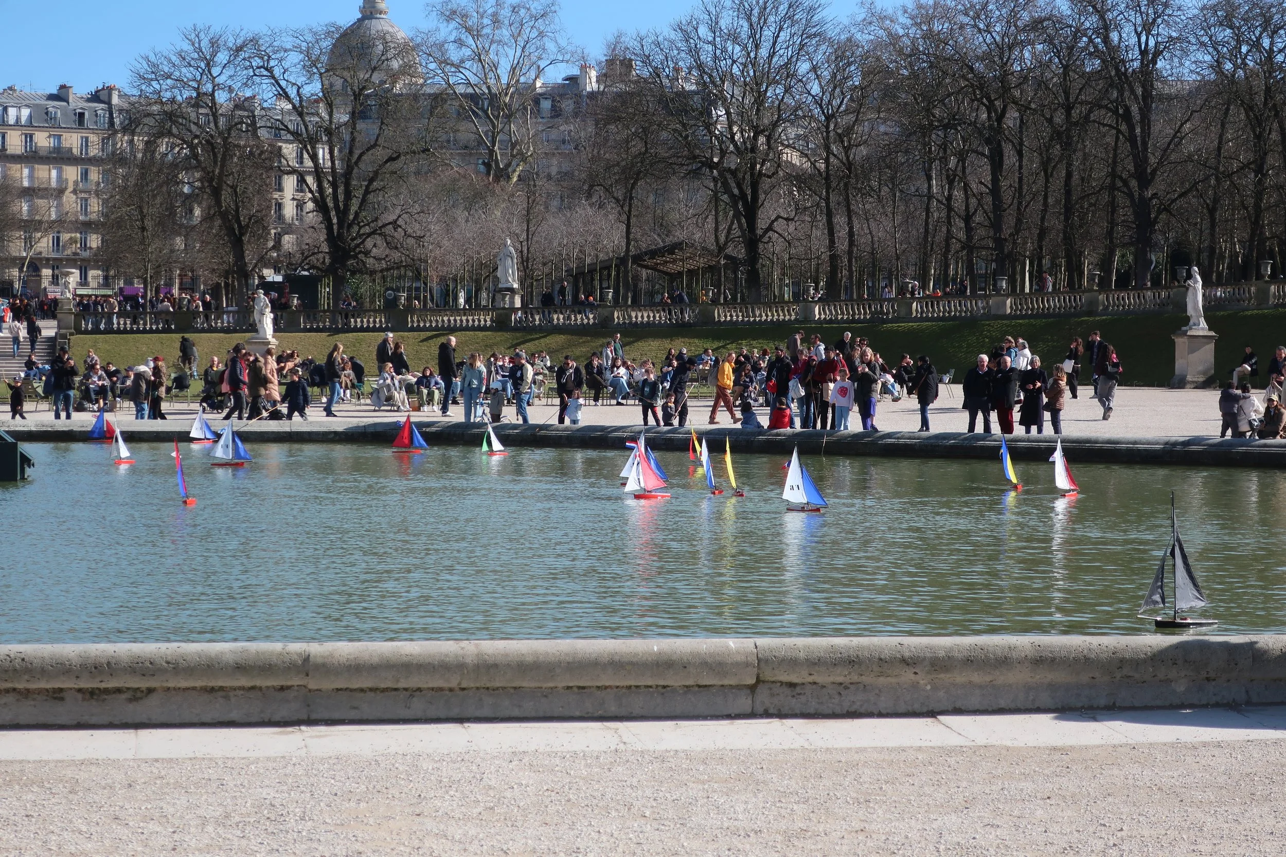  Paris--Spring 2025--Luxembourg Gardens in the St. Germain des Pres neighborhood,  Children sailing boats in the pool--only wind powered! 