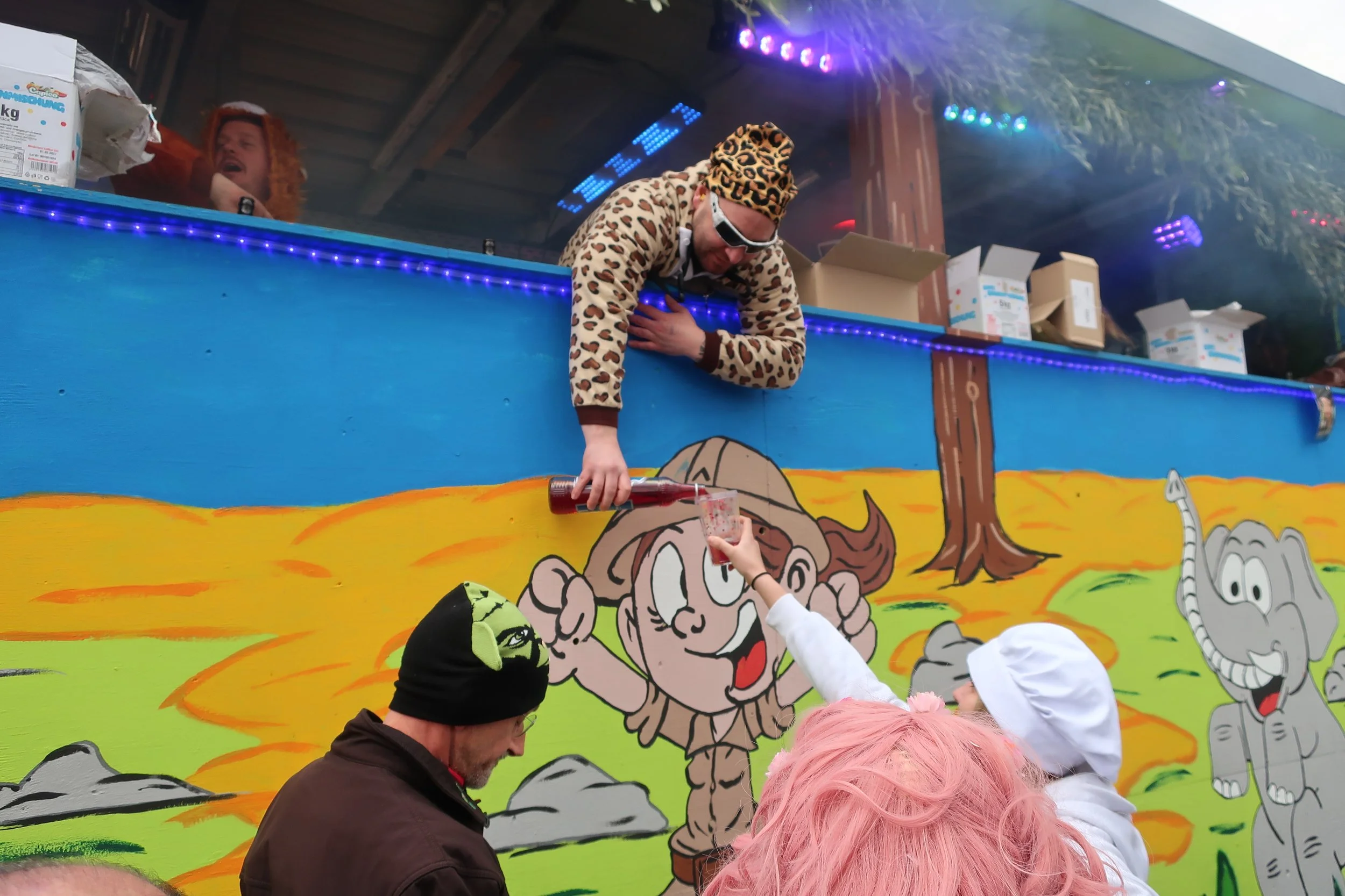  Luxembourg 2025--Remich Cavalcade Celebration--Parade Participants pouring Luxembourgish wine to parade-goers 