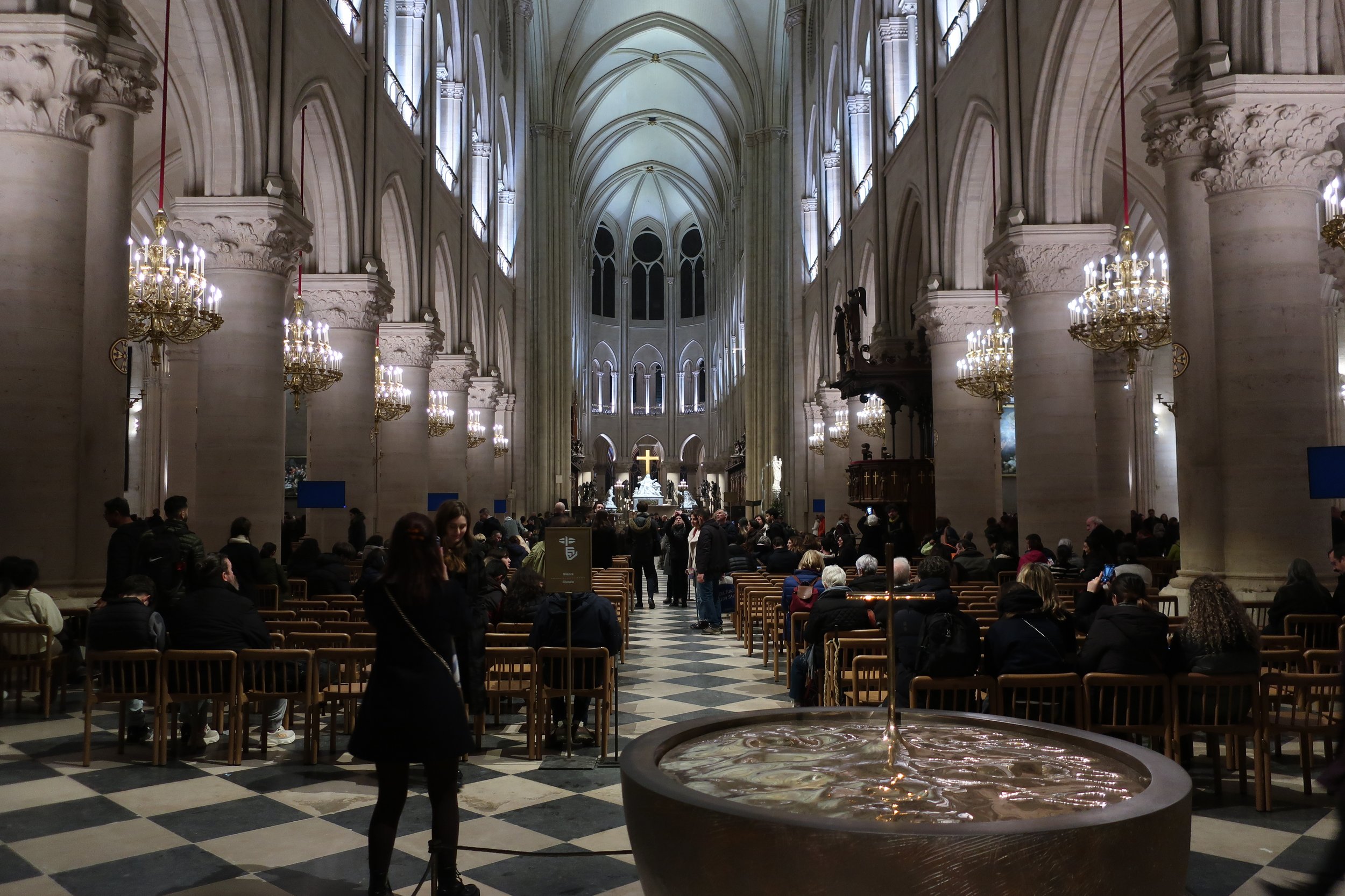  Paris--Spring 2025--Notre Dame, The Nave and baptismal font 