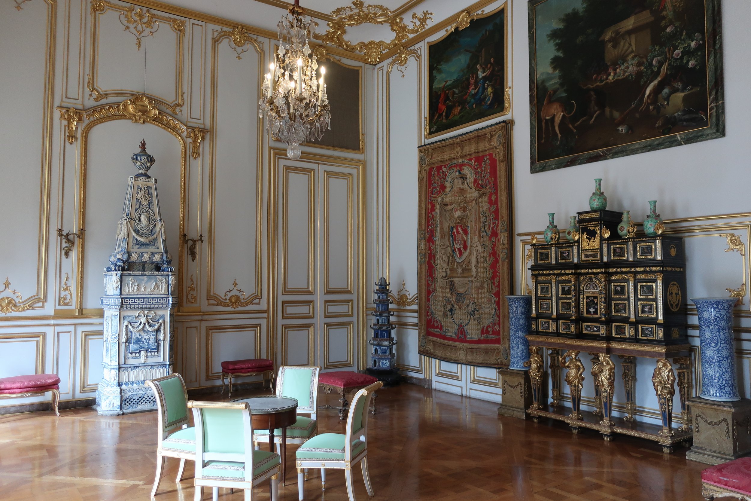  France--Strasbourg 2025--Rohan Museum--Ceramic heater and ornate cabinet 