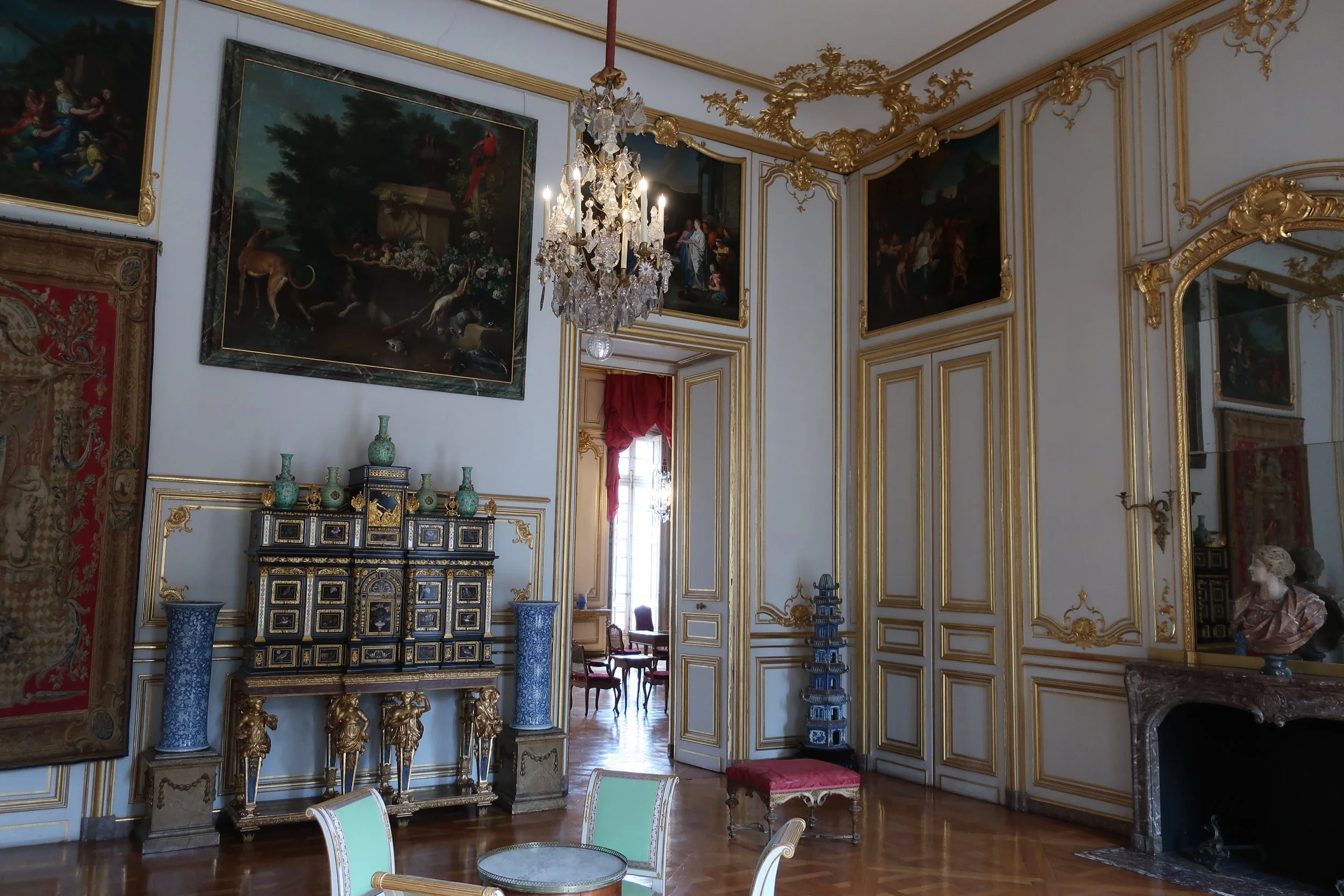  France--Strasbourg 2025--Rohan Museum--Ornate cabinet in room leading into game room 