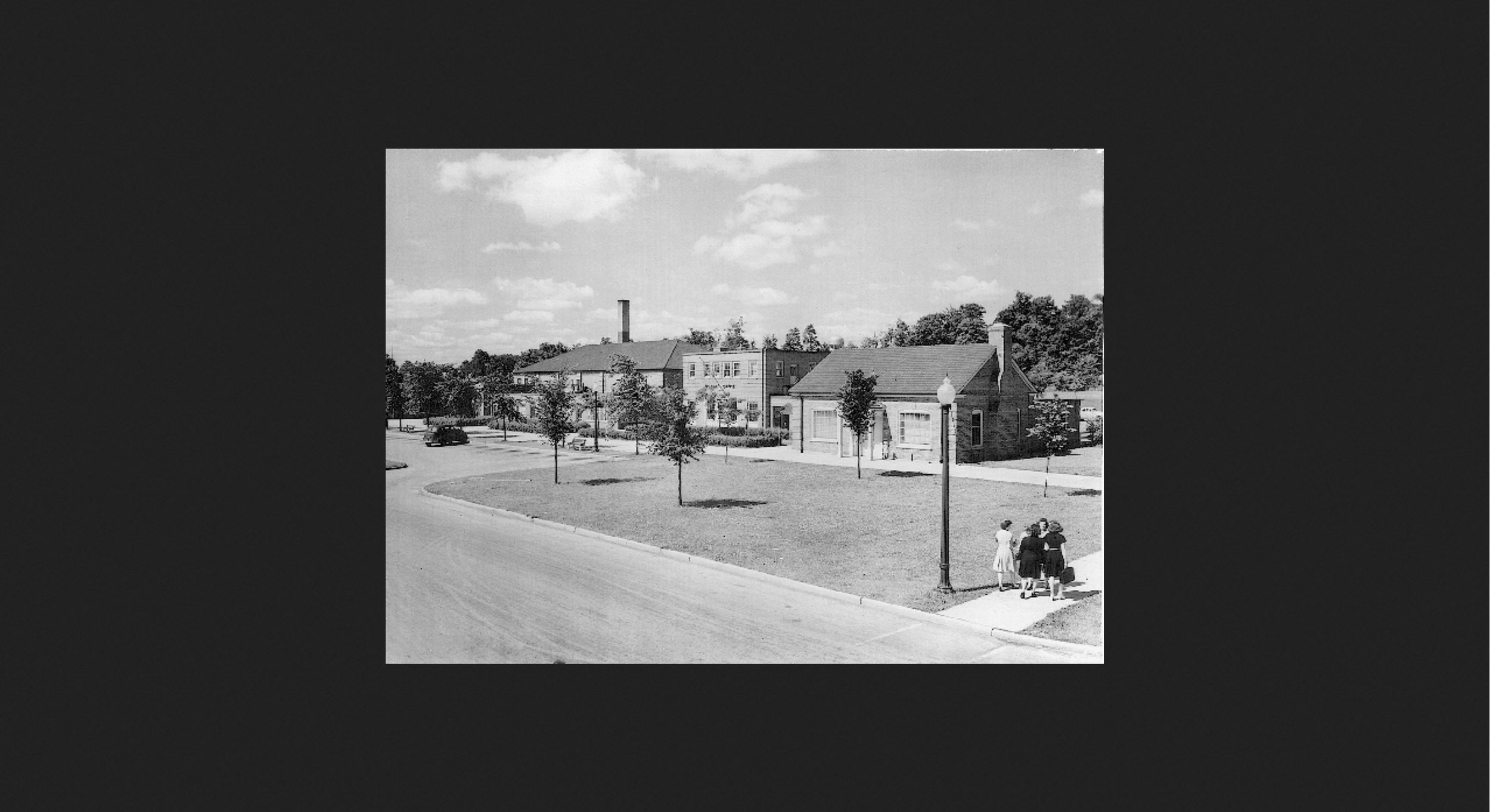 Northwest-Side-of-Broad-Street-Greendale-Town-Center-Late-1930s-Source-Greendale-png-PNG-Image-616-×-442-pixels-.png