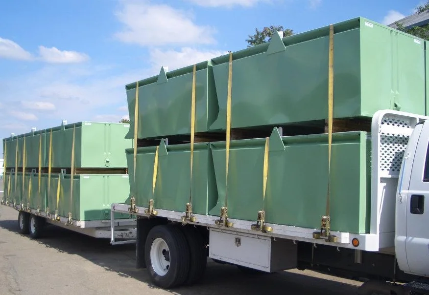 Green bins on truck.jpg