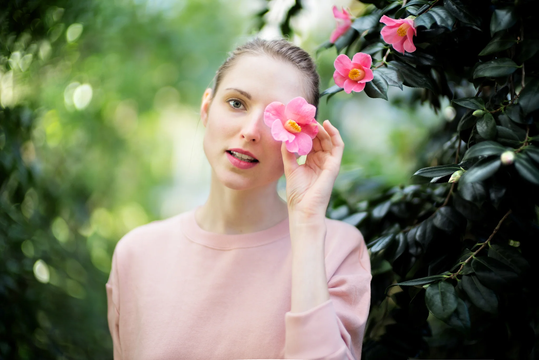 Going to the Botanical Garden with Louise. We found a flower on the floor from a nearby plant inside one of the major greenhouses. The Noctilux turned the greenhouse plants and tress into some kind of impressionistic painting. Most of my work is black and white but this one had to be color I think with the pink flower the pink shirt and pink lips and the many green tones from the leaves. Leica M240 + Leica M 50mm Noctilux 0.95 ASPH.