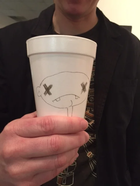 Drawings on cups of coffee