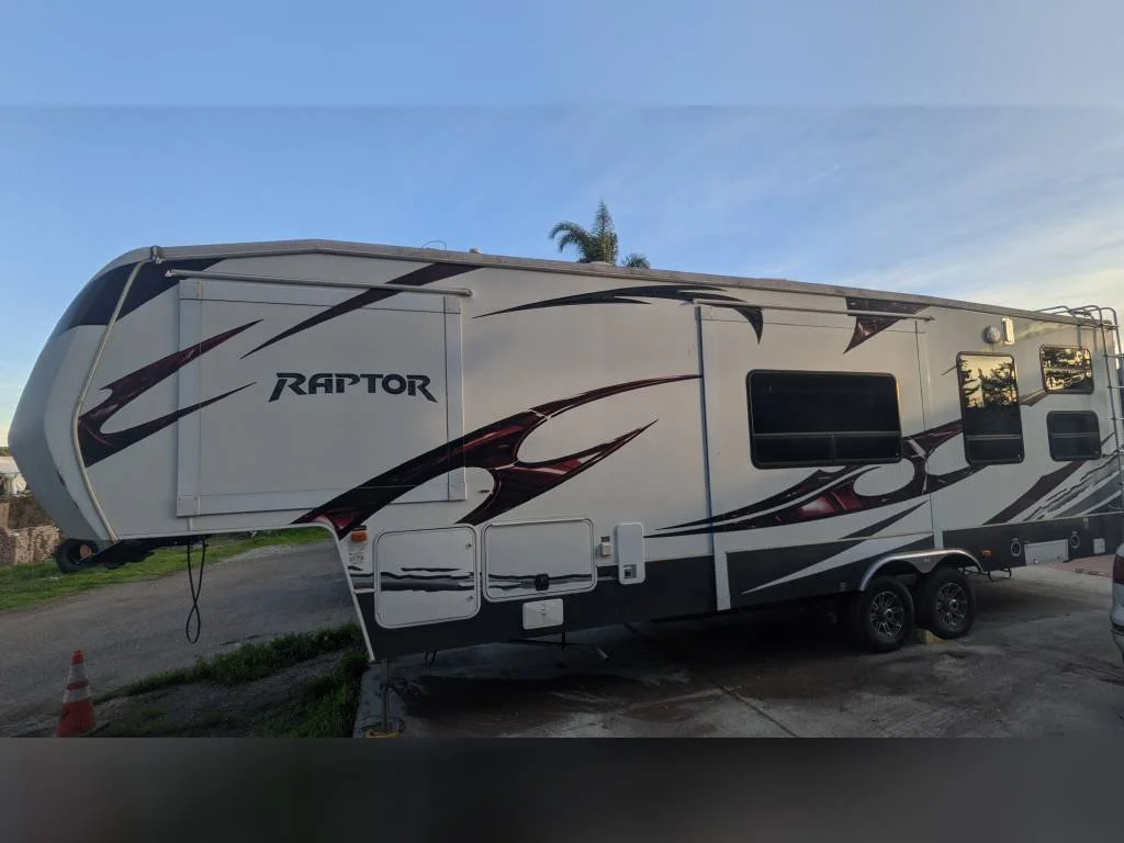 2012 Keystone Fifth Wheel RV RAPTOR 300MP Side