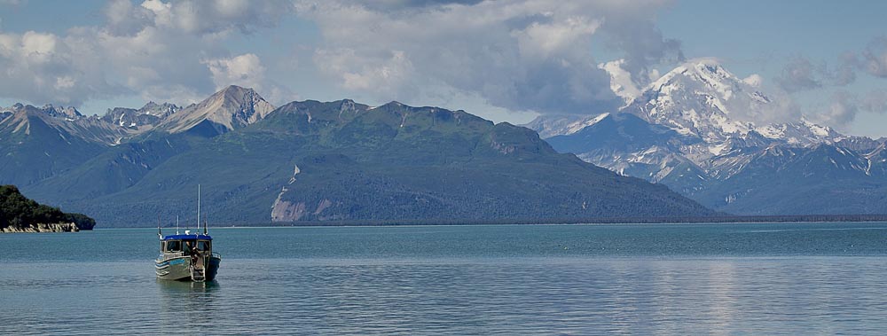 The Stormy Skye anchored off Duck Island. Mt Redoubt, an active volcano, to the far right.