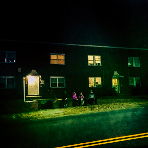 Family on Curb