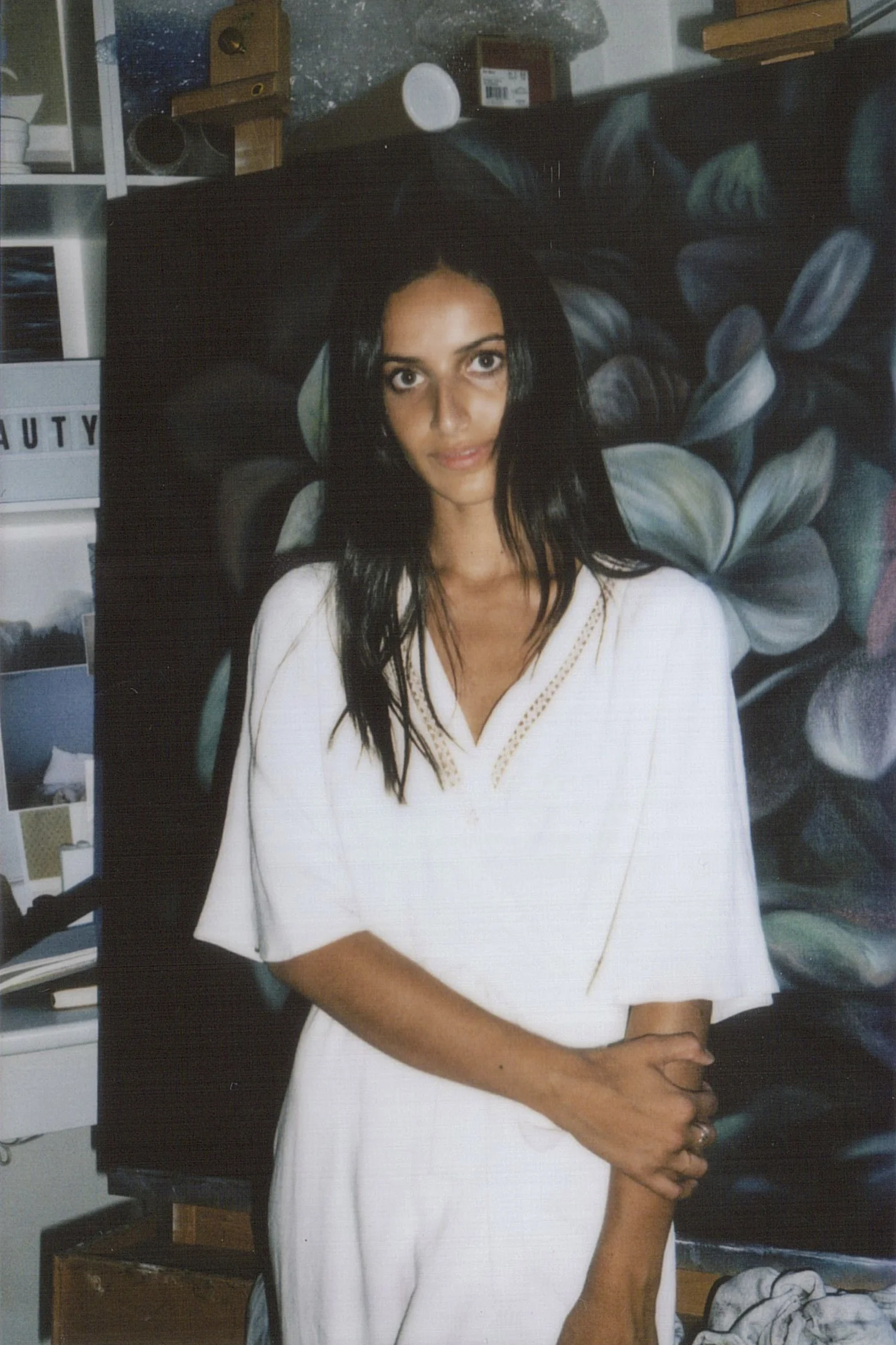 Wearing: Kimono and Rings, Model's own. Artwork by Leanne Thomas .