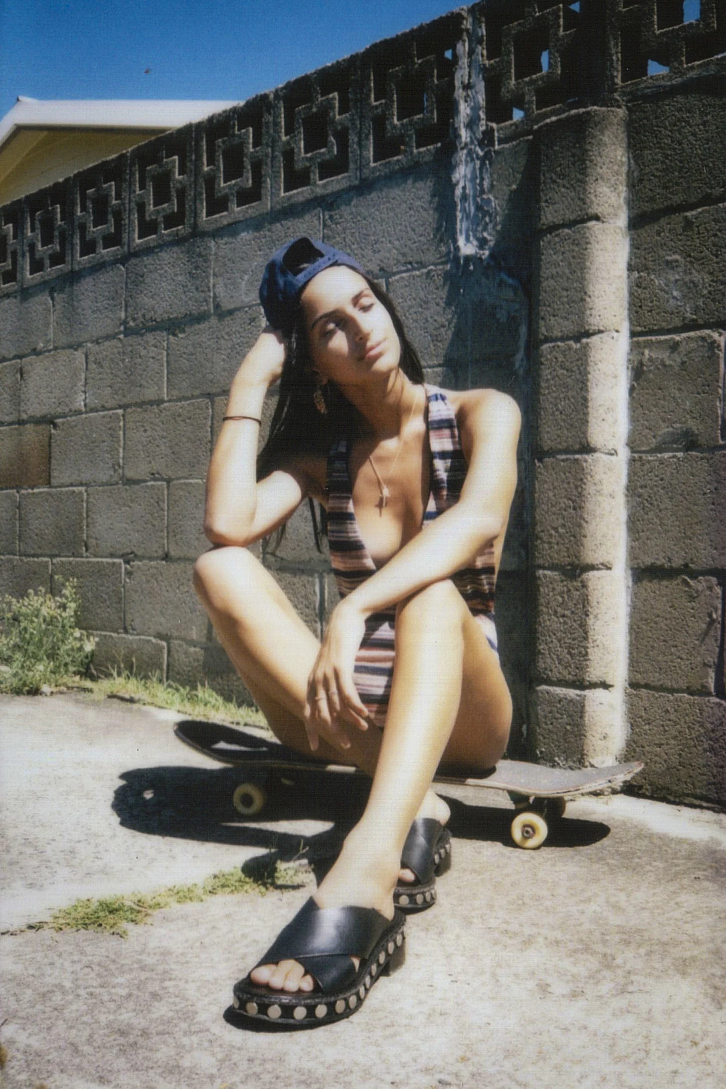 Wearing: Cap by Calvin Klein , Urban Outfitters Bodysuit , All Saint Sandals , Forever 21 Earrings , Bagatiba Necklace