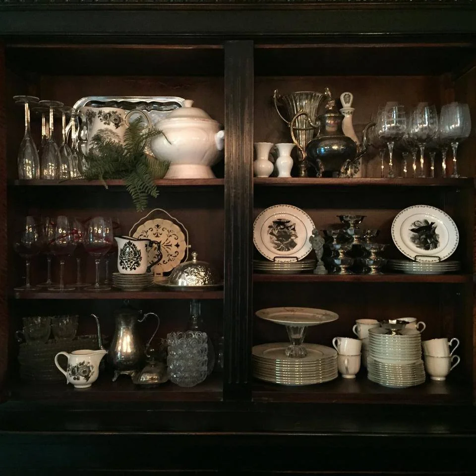 A peek inside the dining room buffet! Don't hide all your pretties...put them on display!