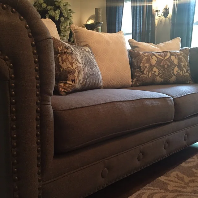 I love the soft contrast of these colors... and who can resist nailhead trim? 