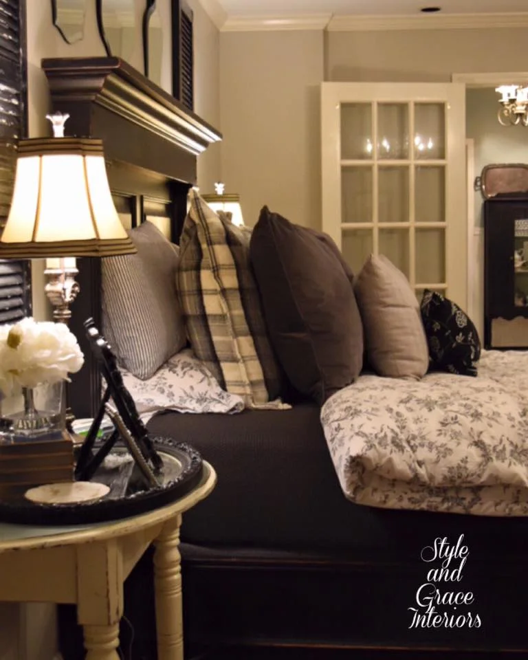 The more pillows, the better! That's what I always say! I just love layering in all sorts of pillows on our bed! Plus- I love our unique end tables on either side of the bed! Take one fun little table, cut it in half and you have two one of a kind end tables!