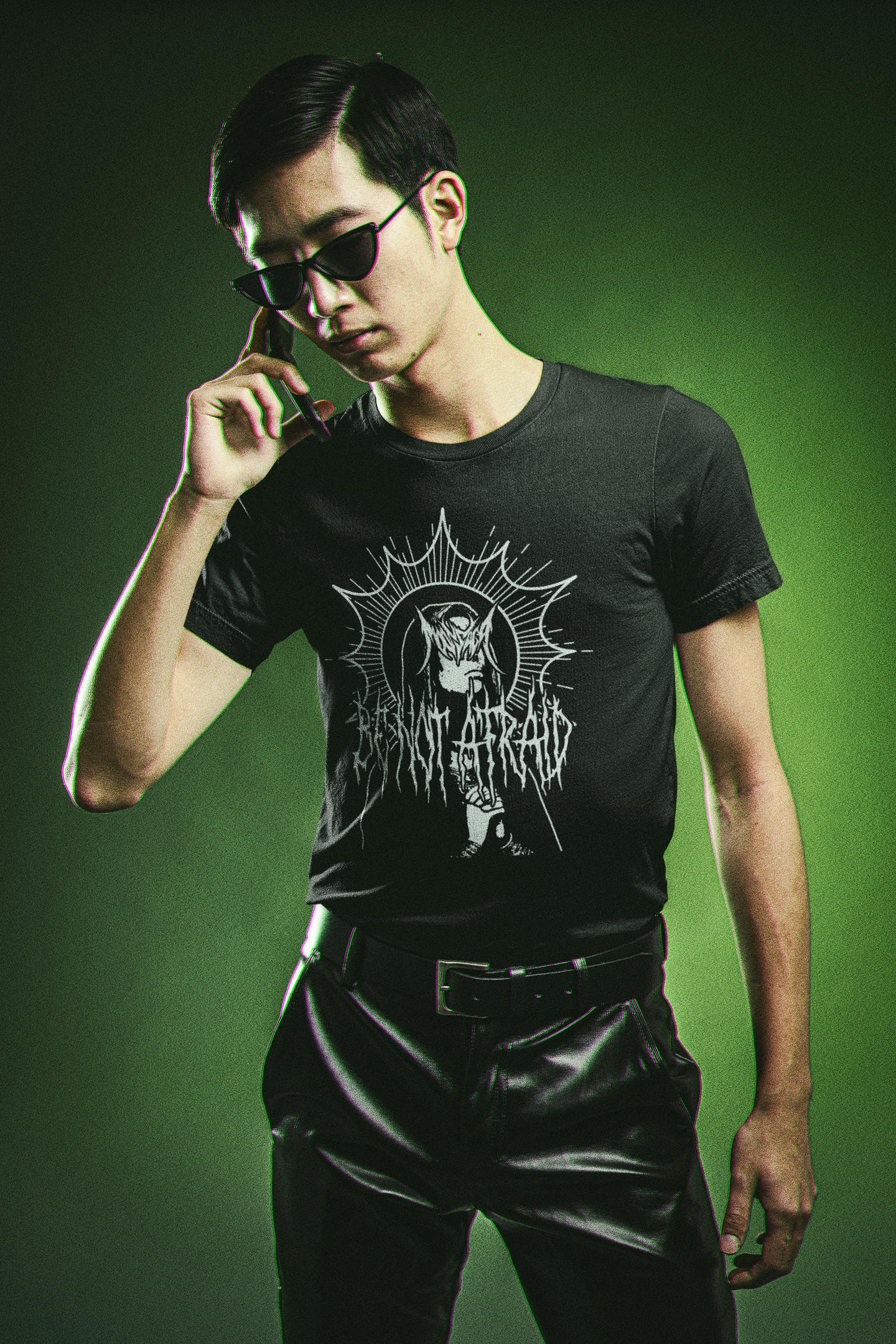 t-shirt-mockup-featuring-a-man-in-a-matrix-inspired-outfit-making-a-call-m20638 (1).png