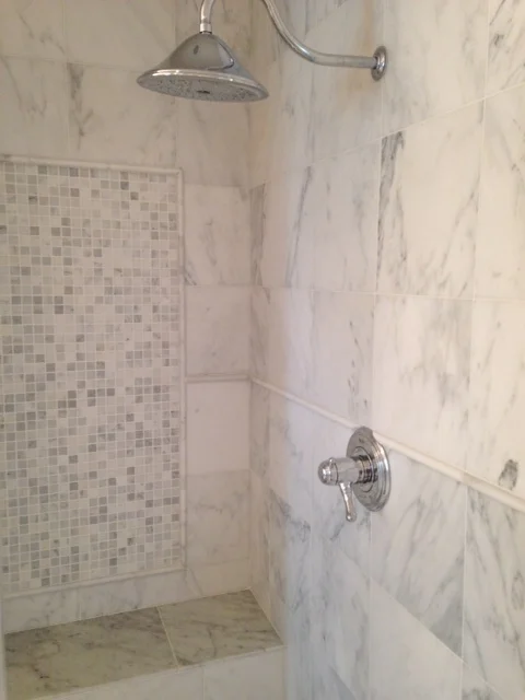 Having someone else clean your stone showers is a perfectly acceptable option.