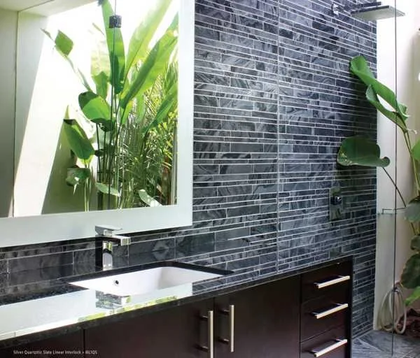 Clean structured lines create order: the dark tiles project a dramatic tone.