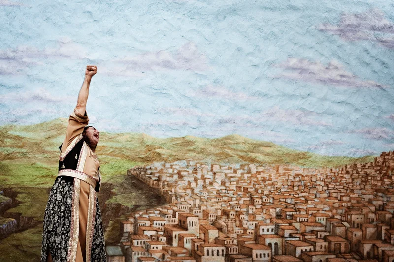  A costumed staff member dances to gospel songs. 