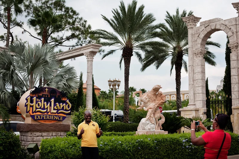  A visitor poses for a photograph as he leaves The Holy Land Experience. 