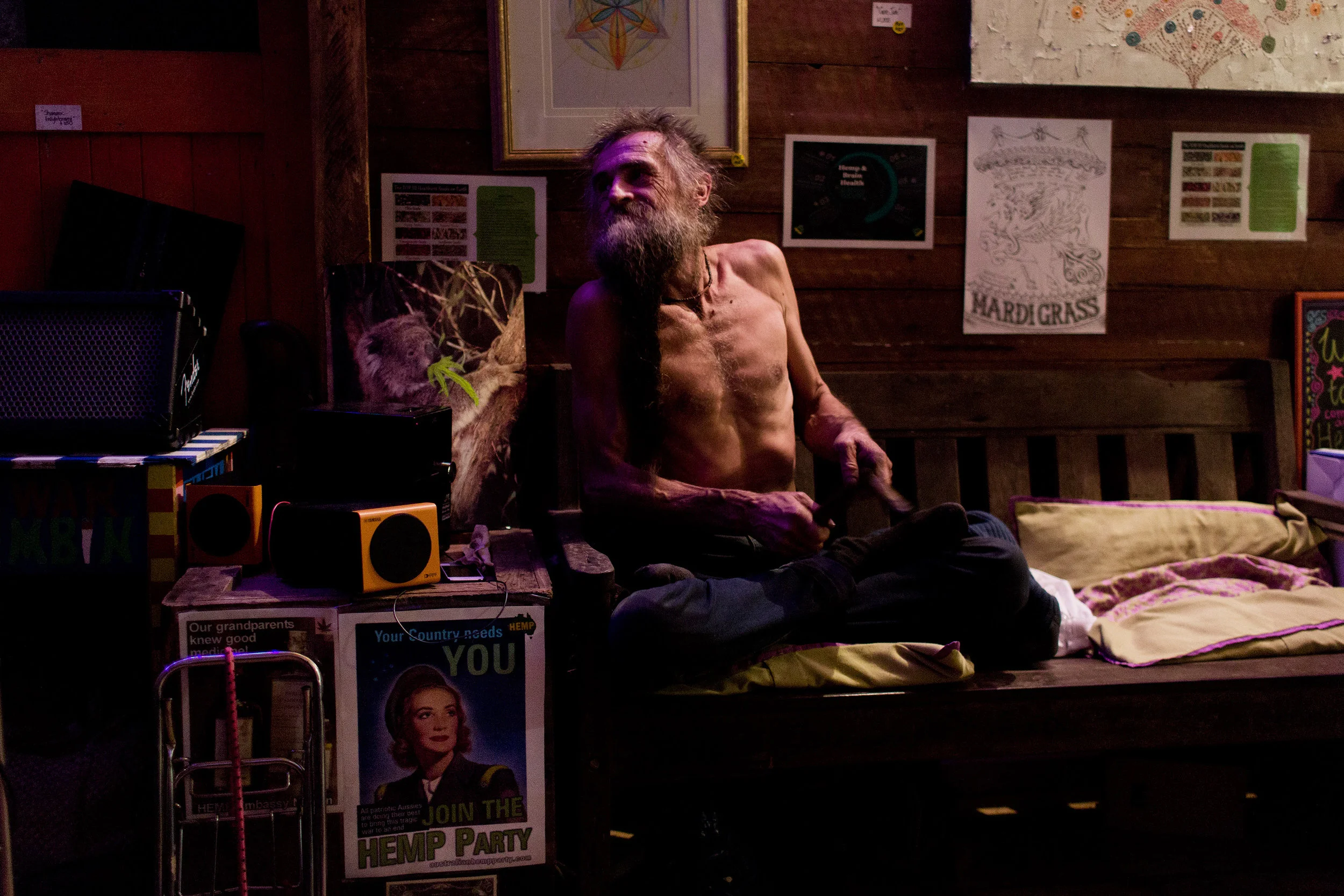  An elderly man enjoys live music at the Hemp Bar in Nimbin NSW, Australia. The Hemp Bar is a favourite amongst locals and tourists, offering a range of legal hemp food and beverage options. 