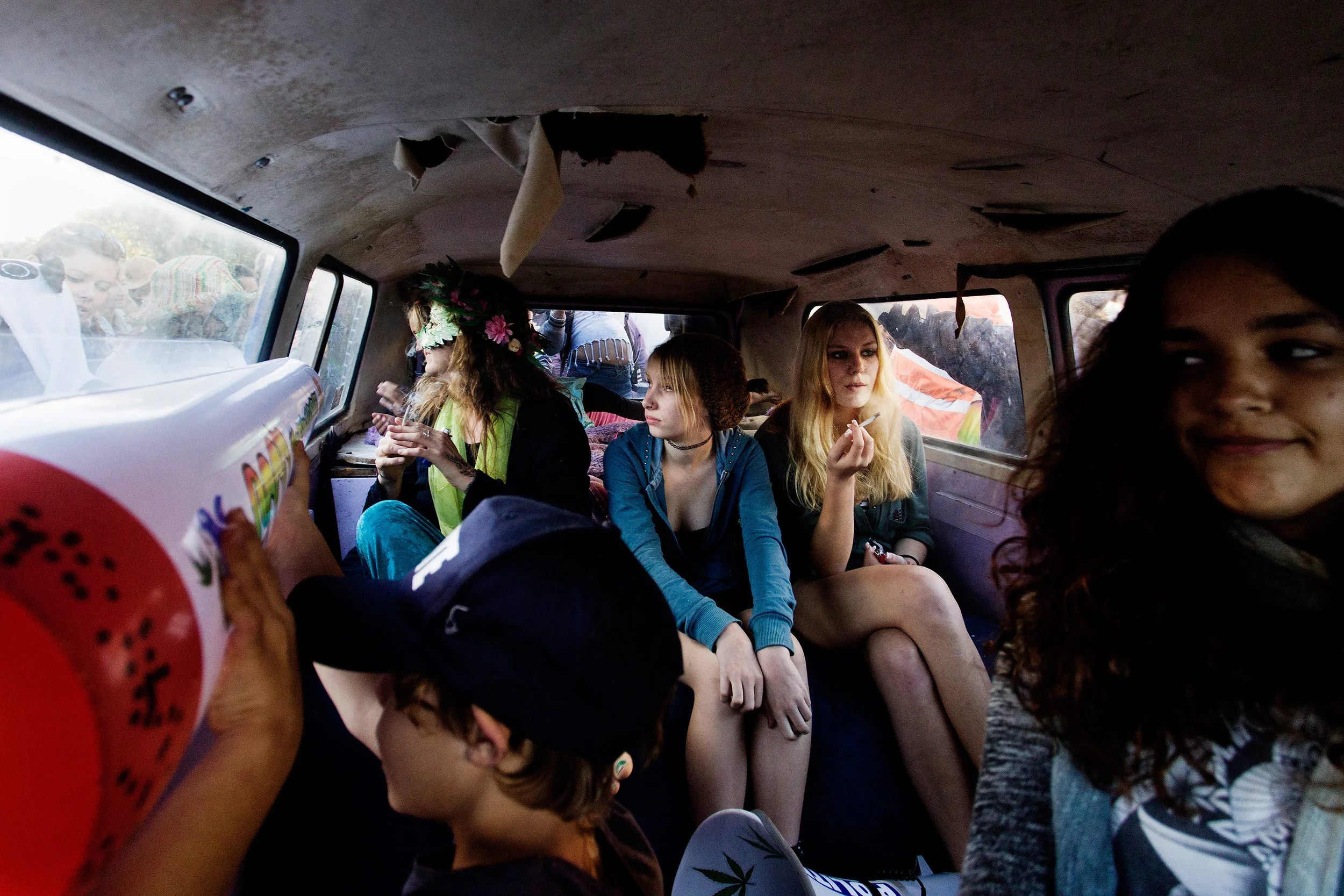  A Volkswagen Kombi van carries young passengers through the crowds of the parade, showing their support for cannabis law reform in Nimbin NSW, Australia. Byron Bay and Lismore contingents arrived in town at 4.20pm. 